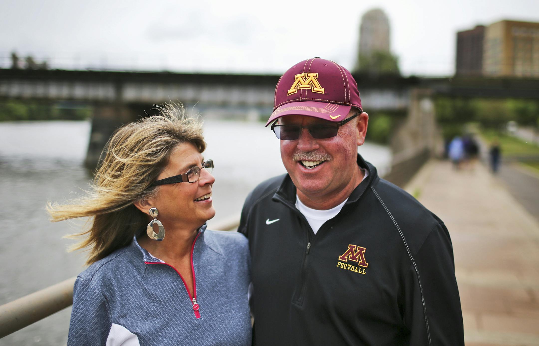 University of Minnesota football coach Jerry Kill and his wife Rebecca walked the trail along the Mississippi River near downtown Minneapolis Saturday, July 27, 2013.](DAVID JOLES/STARTRIBUNE) djoles@startribune.com University of Minnesota football coach Jerry Kill talks about handling his seizures and his expectations for the coming football season. ORG XMIT: MIN1307291412133818