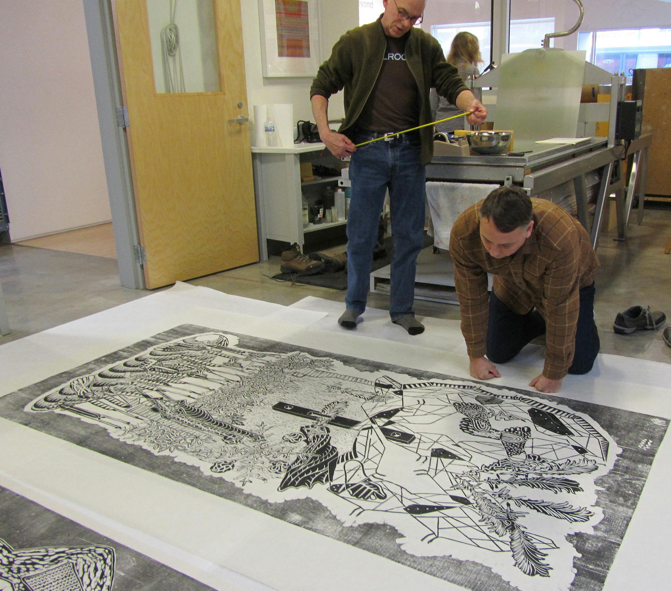 Provided by Highpoint Center for Printmaking Master printerand Highpoint co-founder Cole Rogers, left, and artist Aaron Spangler.