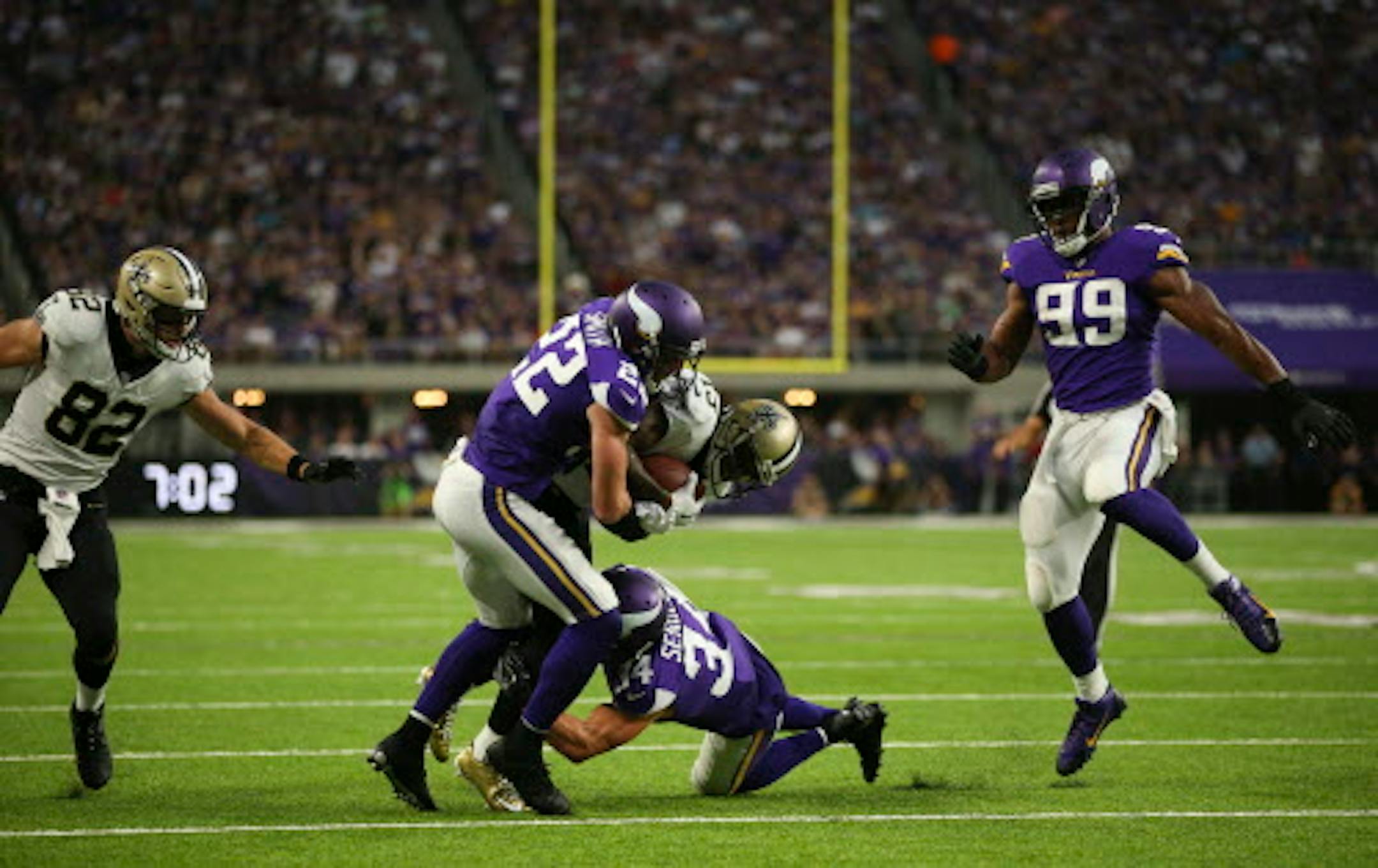 New Orleans Saints wide receiver Ted Ginn (19) was tackled by Minnesota Vikings free safety Harrison Smith (22) short of the goal line in the second quarter.    ]  JEFF WHEELER ' jeff.wheeler@startribune.com