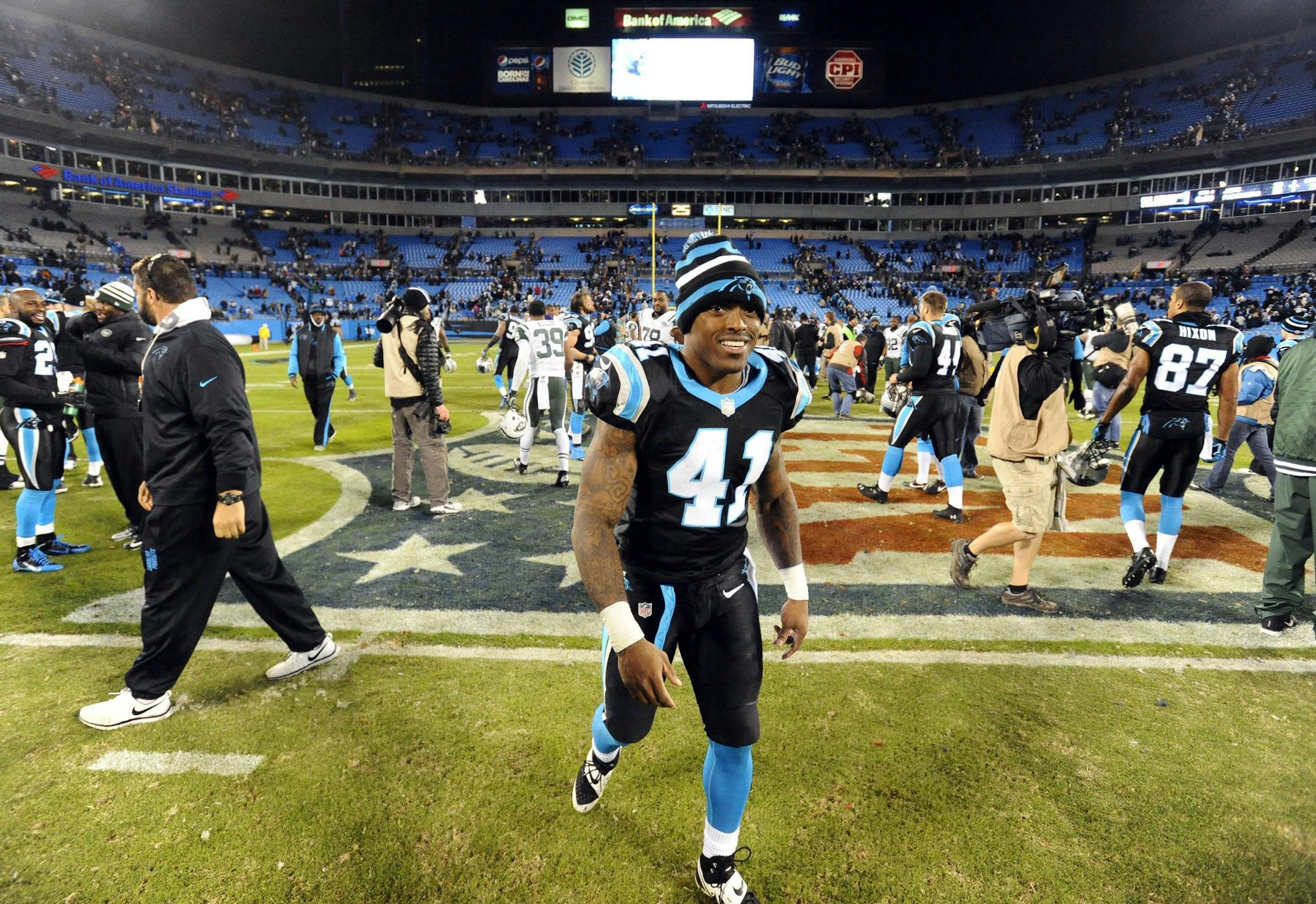 Carolina Panthers' Captain Munnerlyn (41) smiles as he walks off the field after the team's game with the New York Jets at Bank of America Stadium in Charlotte, N.C., on Sunday, Dec. 15, 2013. The Panthers defeated the Jets, 30-20. (David T. Foster III/Charlotte Observer/MCT) ORG XMIT: 1146760