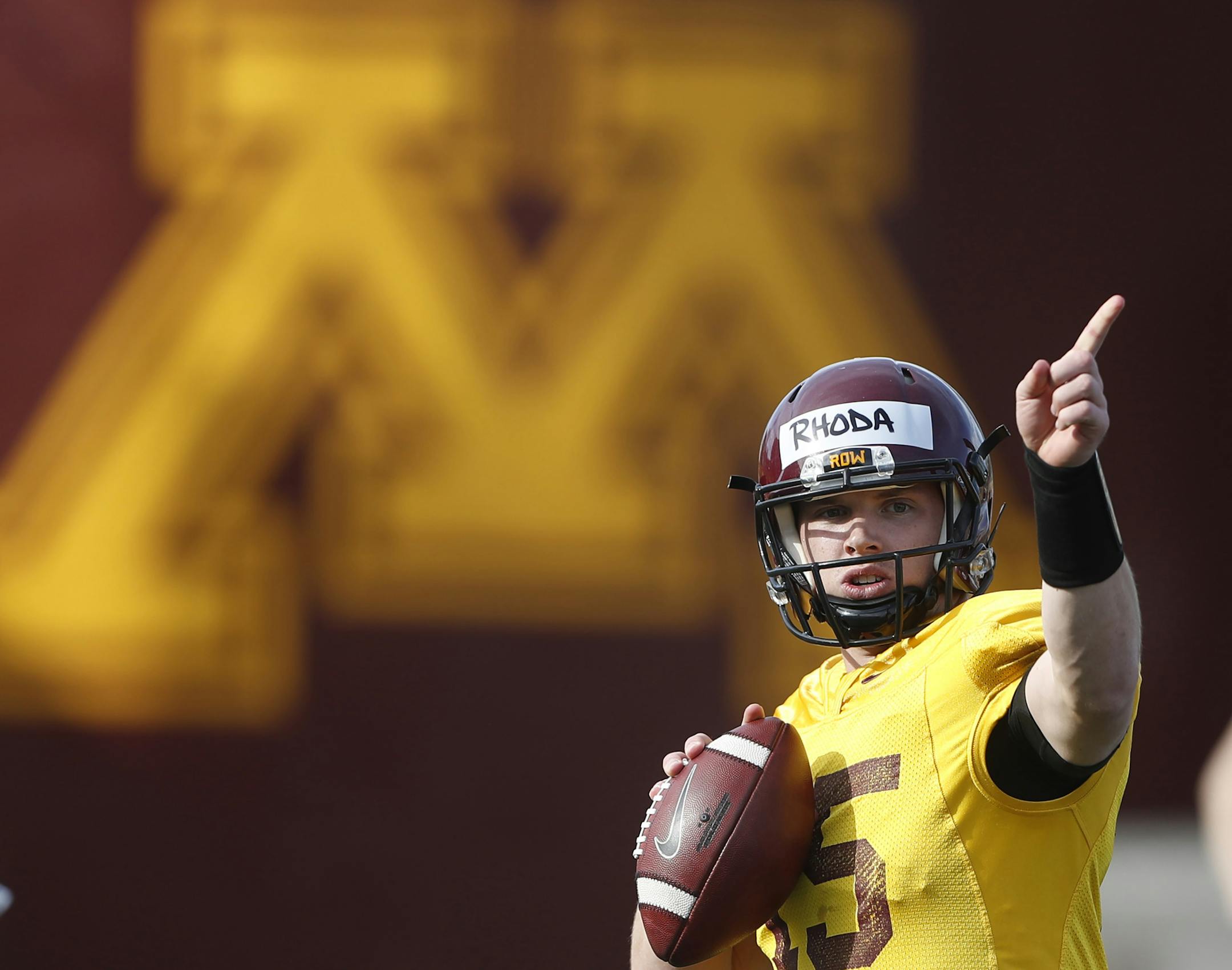 Quarterback Conor Rhoda looked down field during football practice at the University of MinnesotaTuesday March 28 2017 in Minneapolis, MN.] JERRY HOLT &#xef; jerry.holt@startribune.