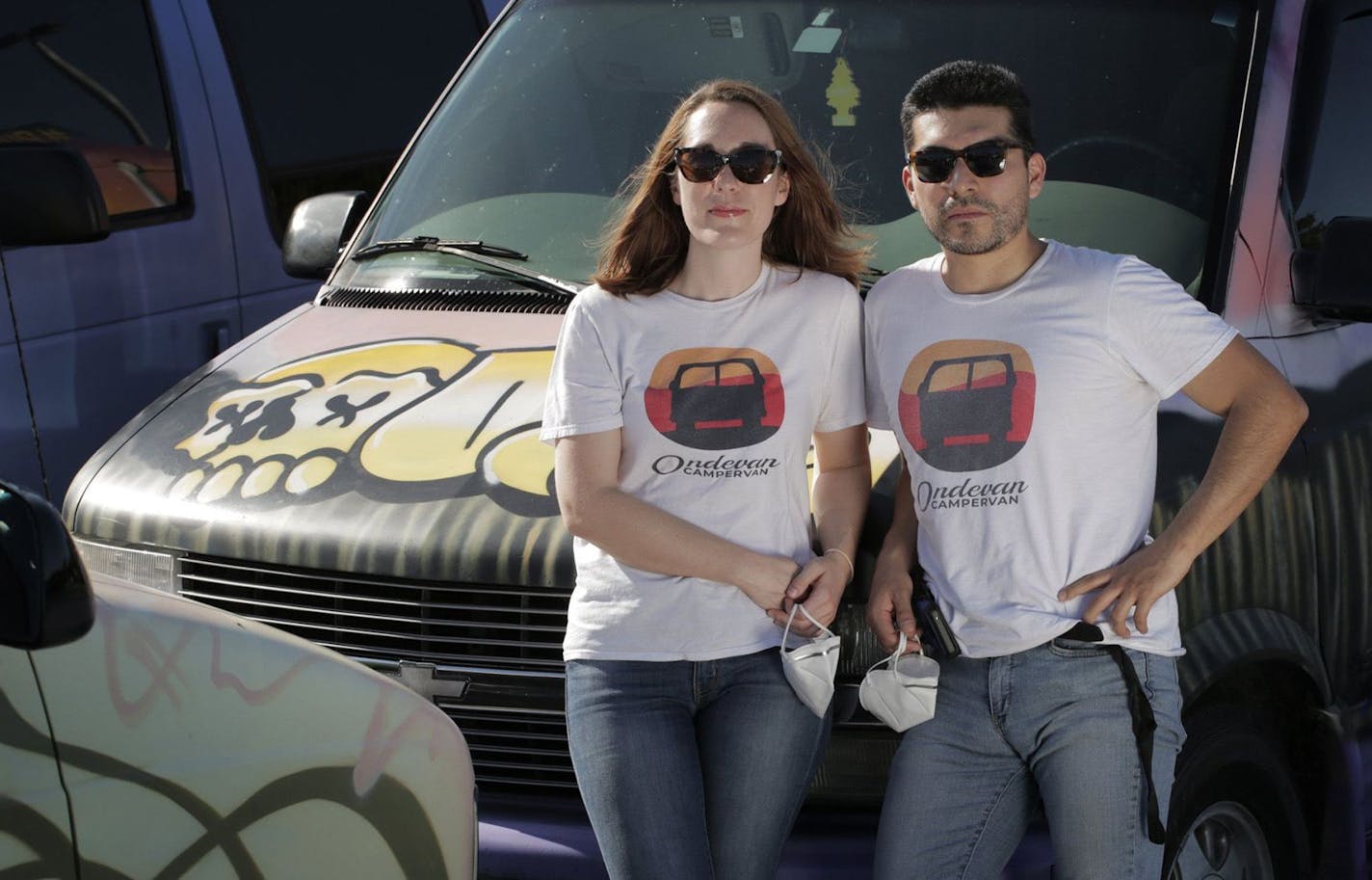 Haley Kirk, left, and Omar Bendezœ, owners of Ondevan, a company that provides camper vans to tourists to travel around the U.S., on May 5, 2020, in Miami. (Jose A. Iglesias/El Nuevo Herald/TNS) ORG XMIT: 1662058