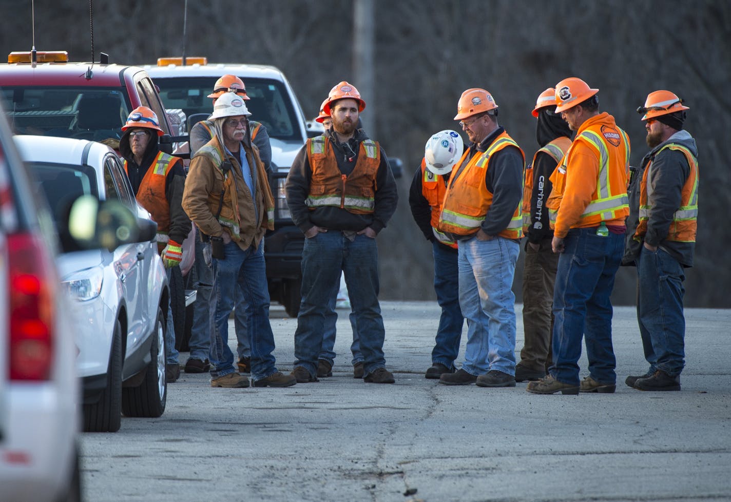 Hazardous Materials contractors waited at Alma Area School before deploying to the site of a train derailment Saturday outside Alma, Wis. ] (AARON LAVINSKY/STAR TRIBUNE) aaron.lavinsky@startribune.com Dozens of train cars derailed at about 9am on Saturday, Nov. 7, a few miles outside of Alma, Wis. The cars were carrying denatured alcohol which may be leaking into the Mississippi River. ORG XMIT: MIN1511072223170551