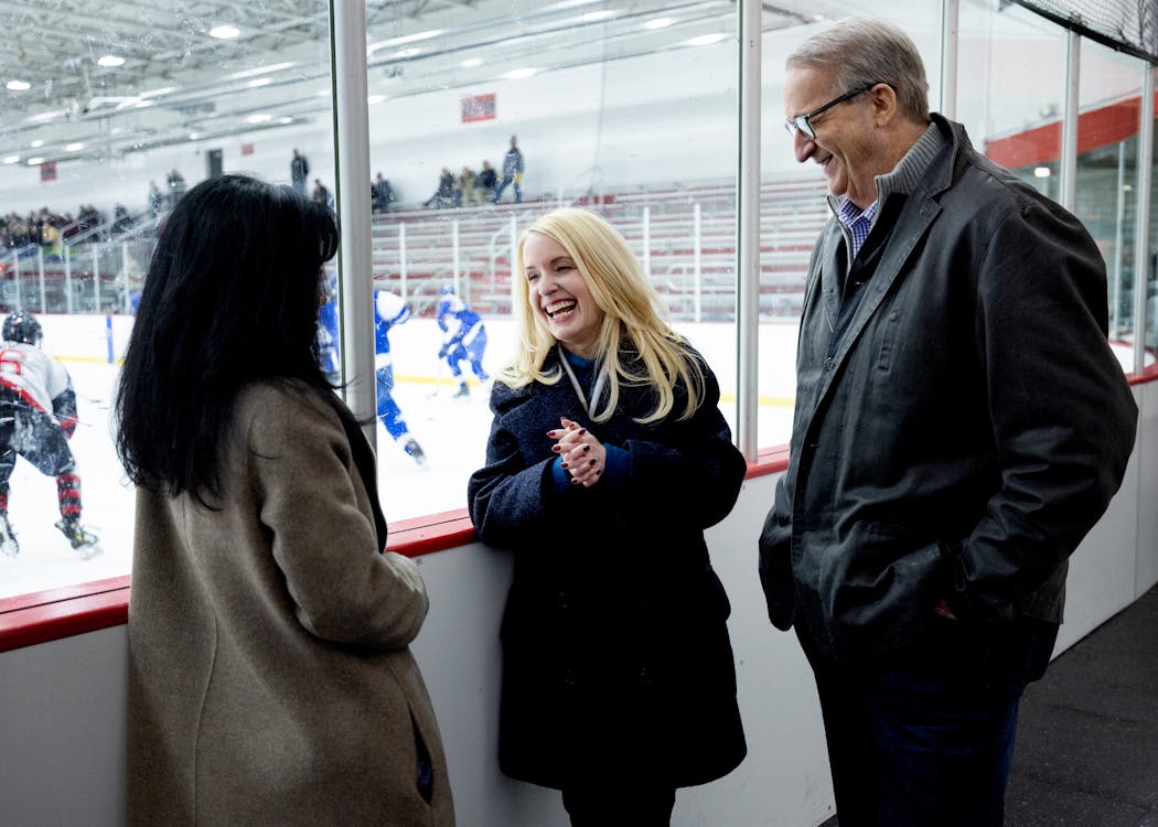 Malina Anderson, Karin Nelsen and Mark Rosen chatted before a hockey game at Eden Prairie Ice Arena. Rosen and Nelsen were at the game to watch  Anderson and Trent Tucker’s son play.