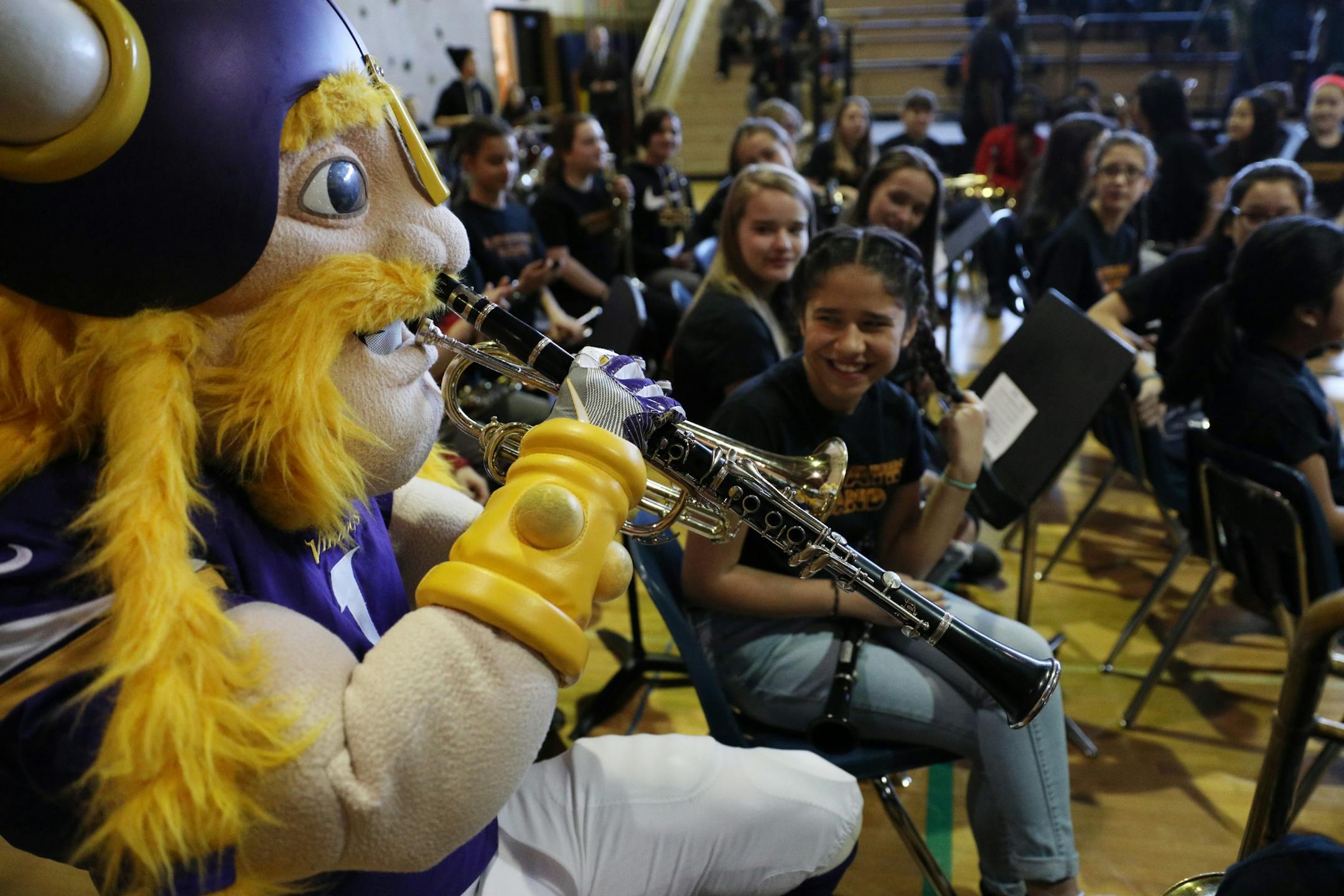 Minnesota Vikings mascot Viktor the Viking jokingly joined in with members of the band as they waited for the start of Thursday's event.