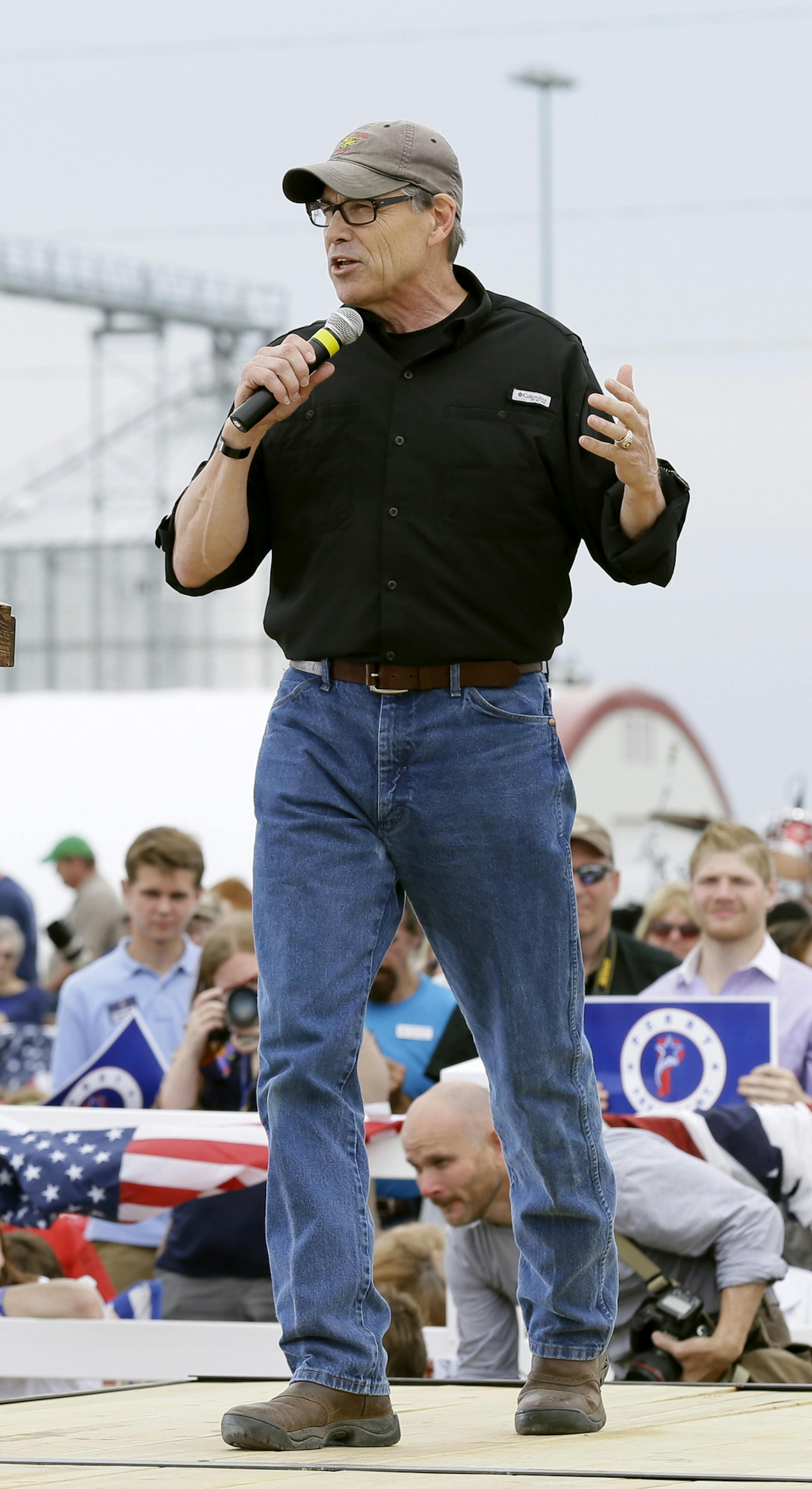 Republican presidential candidate, former Texas Gov. Rick Perry, speaks during a fundraiser for U.S. Sen. Joni Ernst, R-Iowa, Saturday, June 6, 2015, in Boone, Iowa. (AP Photo/Charlie Neibergall)