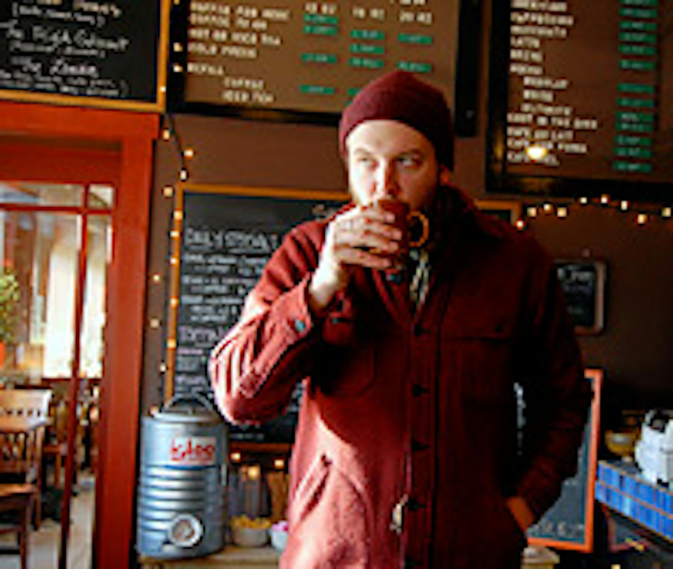 Bon Iver drinking coffee at Racy D'Elenes in downtown Eau Claire