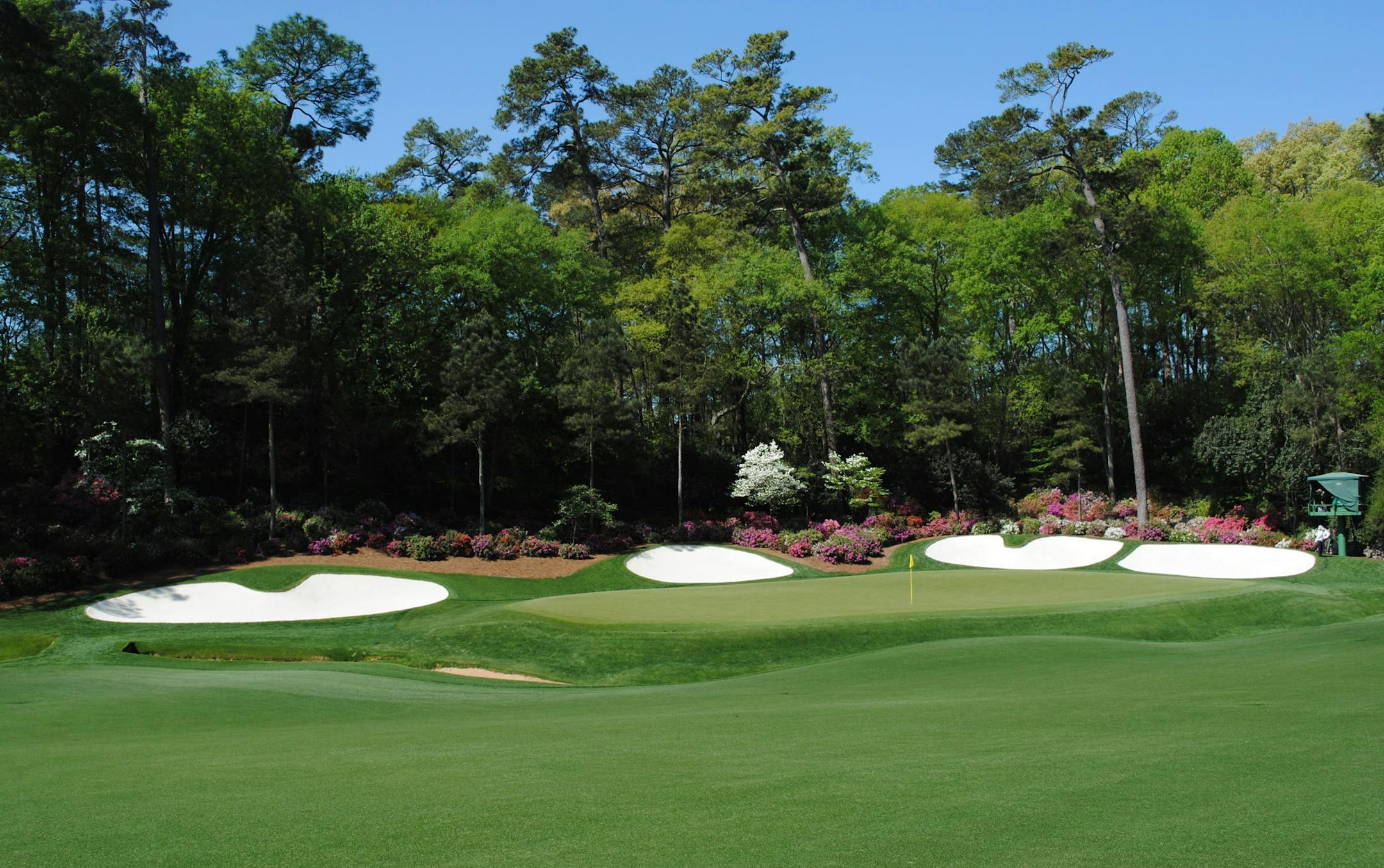 Amen Corner, the most storied section of Augusta National, is usually in full bloom with azaleas, dogwoods and magnolias during Masters Week. (Augusta Convention and Visitors Bureau)