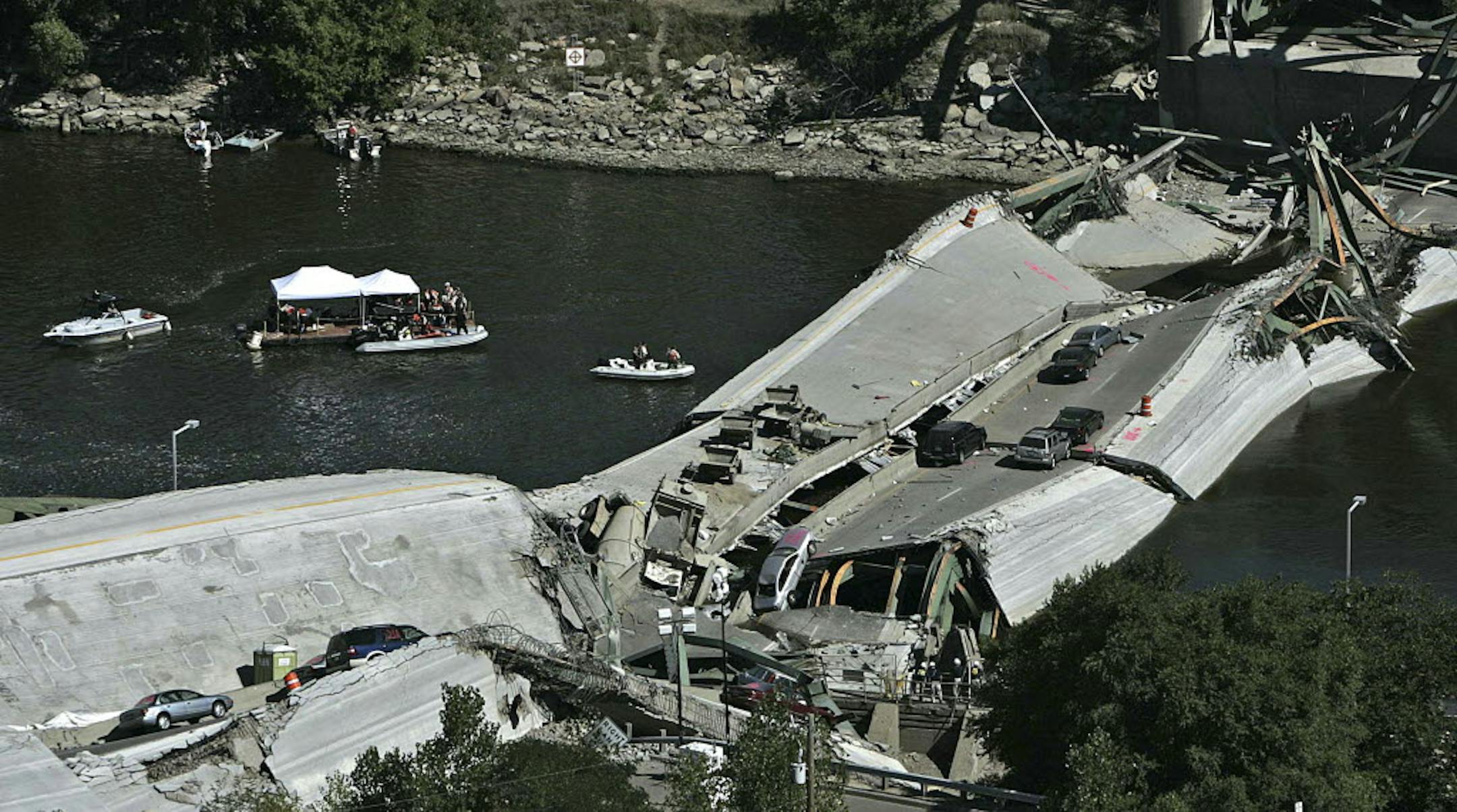 Aug. 3, 2007: Divers continue recovery efforts at the scene where the 35W bridge collapsed in Minneapolis.