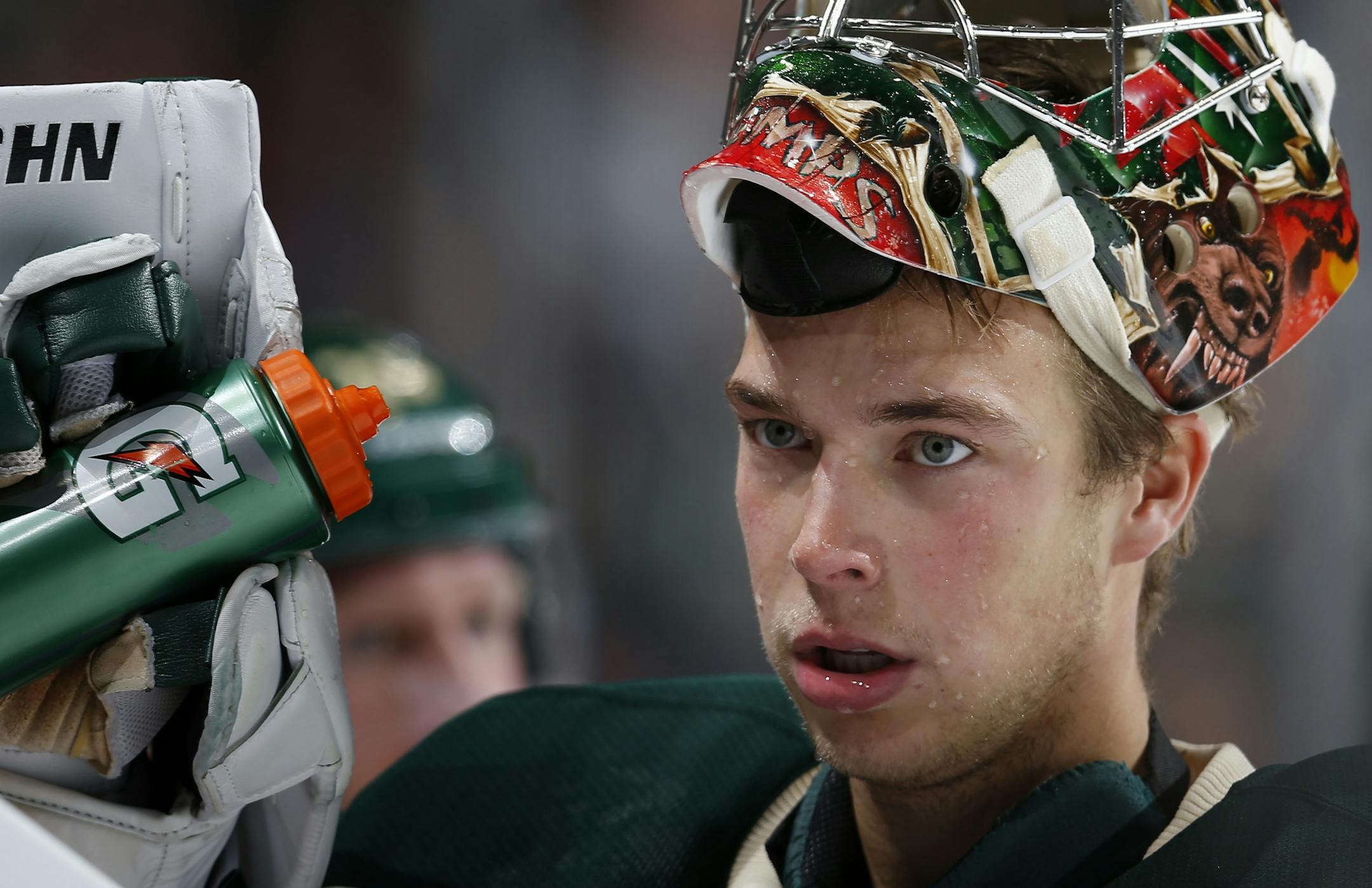 Minnesota Wild goalie Darcy Kuemper during a time out in the third period. Minnesota beat Colorado by a final score of 5-0. ] CARLOS GONZALEZ cgonzalez@startribune.com - October 9, 2014 , St. Paul, Minn., Xcel Energy Center, NHL, Minnesota Wild vs. Colorado Avalanche Season opener