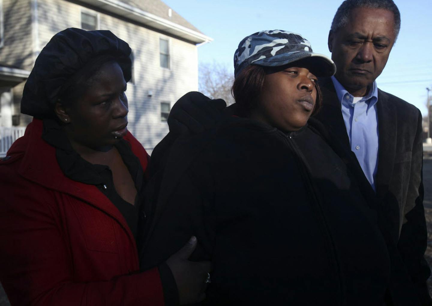 Marsha Mayes spoke of wanting to find who fired the bullet that killed her son. At right is City Council Member Don Samuels.