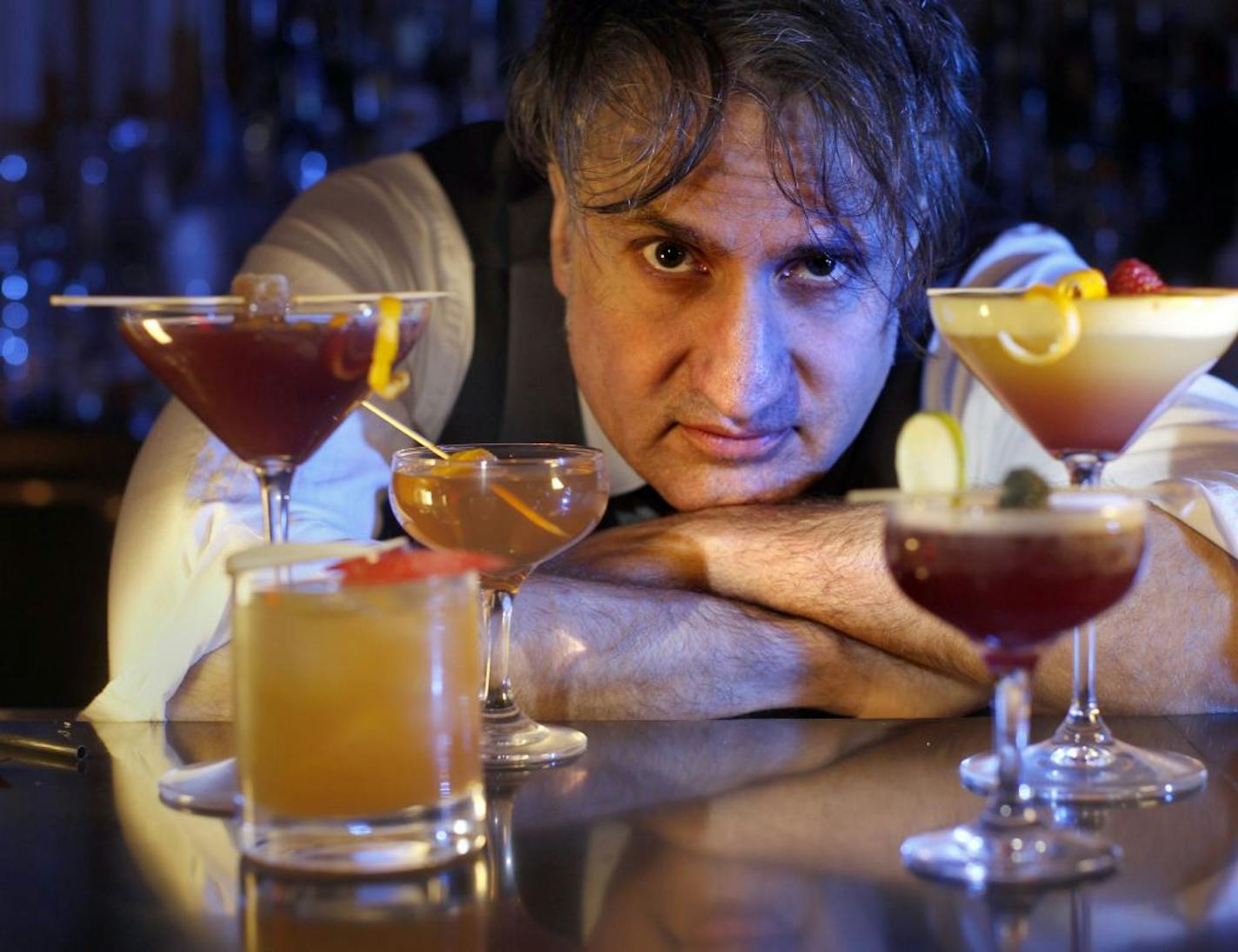 One of the bar scene's top mixologists, Johnny Michaels, has published a book of cocktails. Johnny with some of his cocktails at La Belle Vie, Minneapolis MN.[ TOM WALLACE � twallace@startribune.com _ Assignment _#20020400A October 31, 2011 _ SLUG: drink1106_ EXTRA INFORMATION: Name CQ by writer.