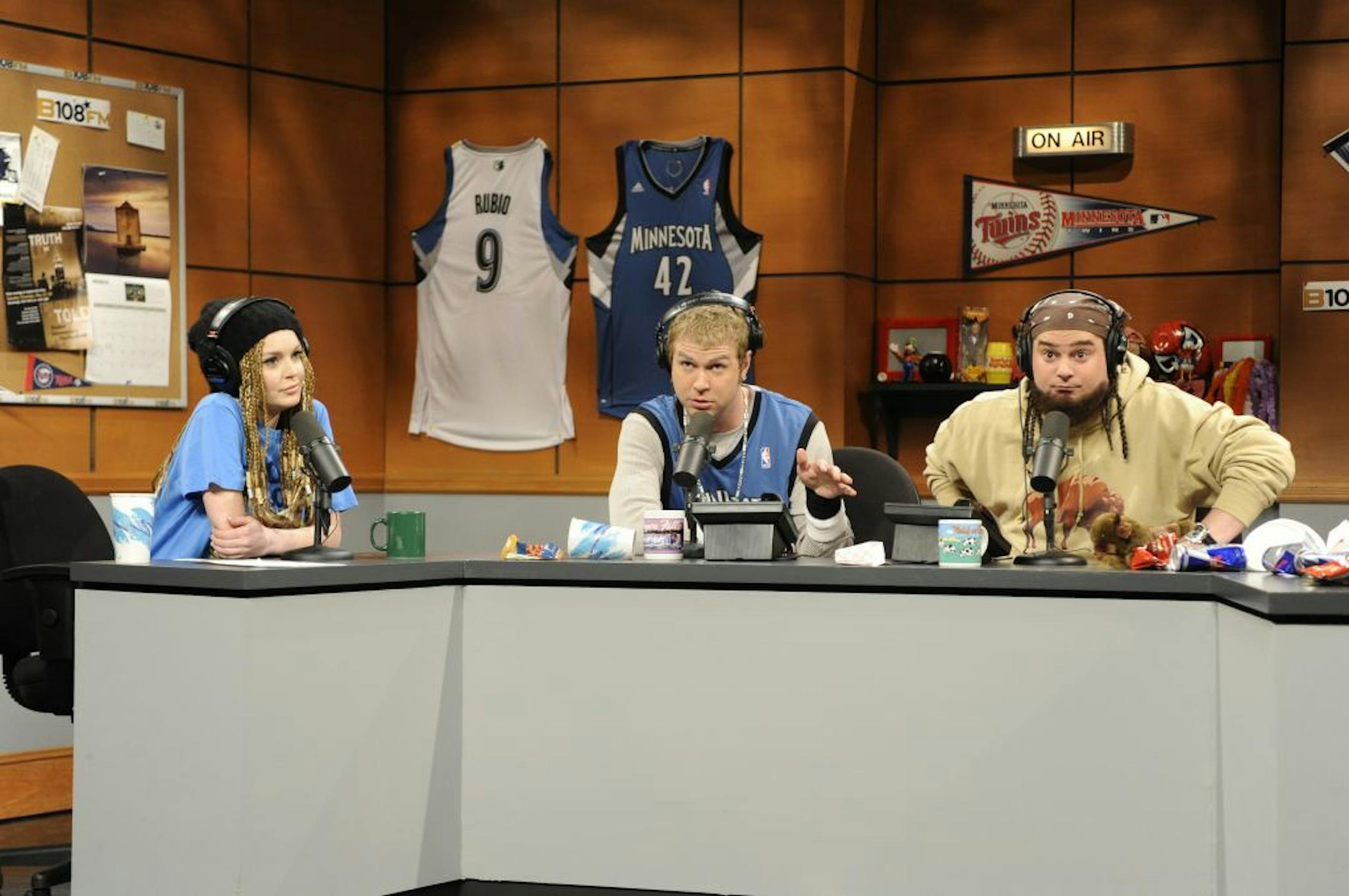 Lindsay Lohan, Taran Killam (in Kevin Love Jersey) and Bobby Moynihan lampooned early-morning radio on last week's "Saturday Night Live."
