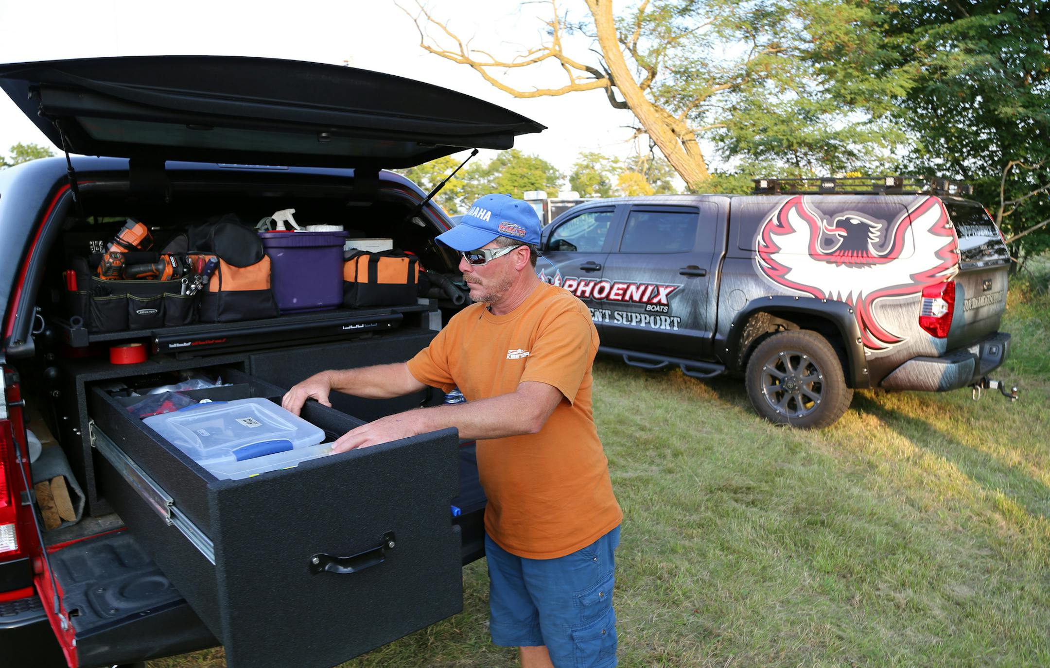 Most kitchens aren't as well organized as the tools carried by the traveling boat and motor mechanics assigned to the big Mille Lacs bass tournament that concludes today. Here Trent Miller of Mountaiin Home, Ark., representing Skeeter boats, checks out some of his fix-it gear.