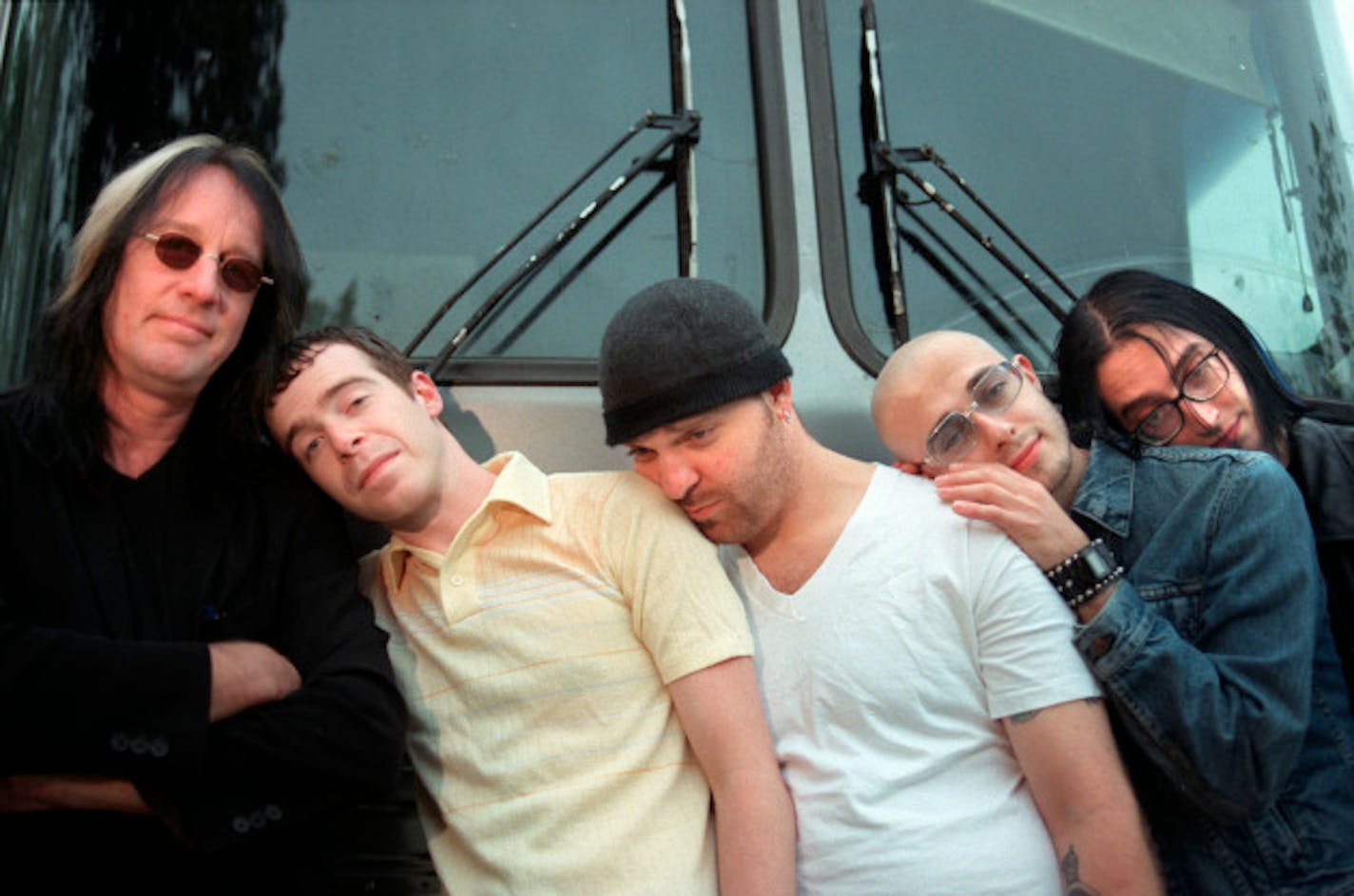 Todd Rundgren propped up the members of 12 Rods in 2000, when the band's lineup featured (left to right) Bill Shaw, Dave King, Ryan Olcott and Ev Olcott. / Richard Tsong-Taatarii, Star Tribune