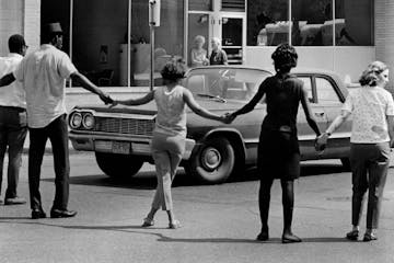 July 22, 1967 People From the Way Community Center Formed A Human Barricade To Keep Sightseers Away. The Kids get excited and want to throw rocks at t