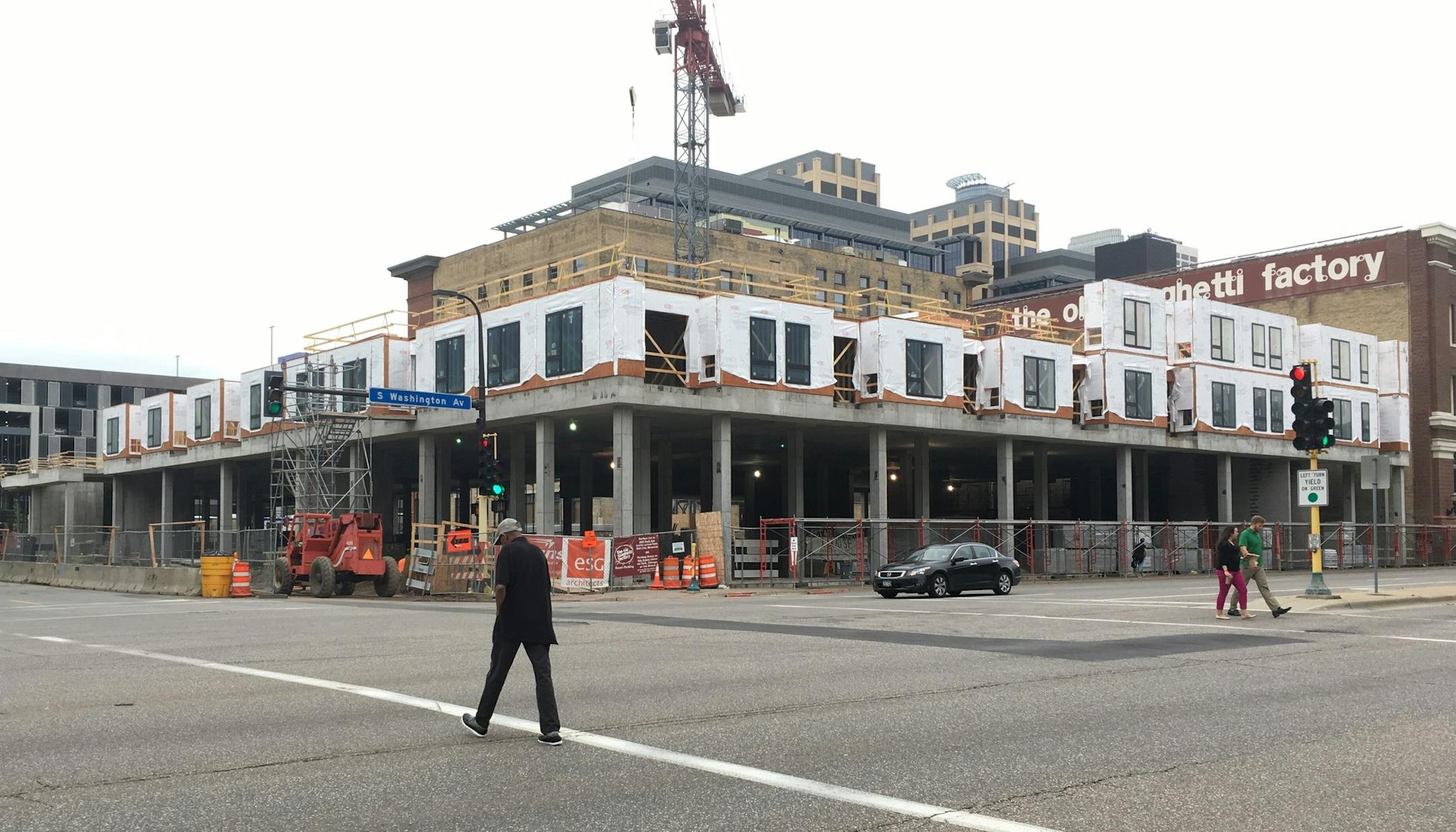 Sherman Associates and Frana Cos. started building a 180-unit apartment complex, with a Trader Joe’s store planned on street level, at Washington and Chicago avenues in downtown Minneapolis.