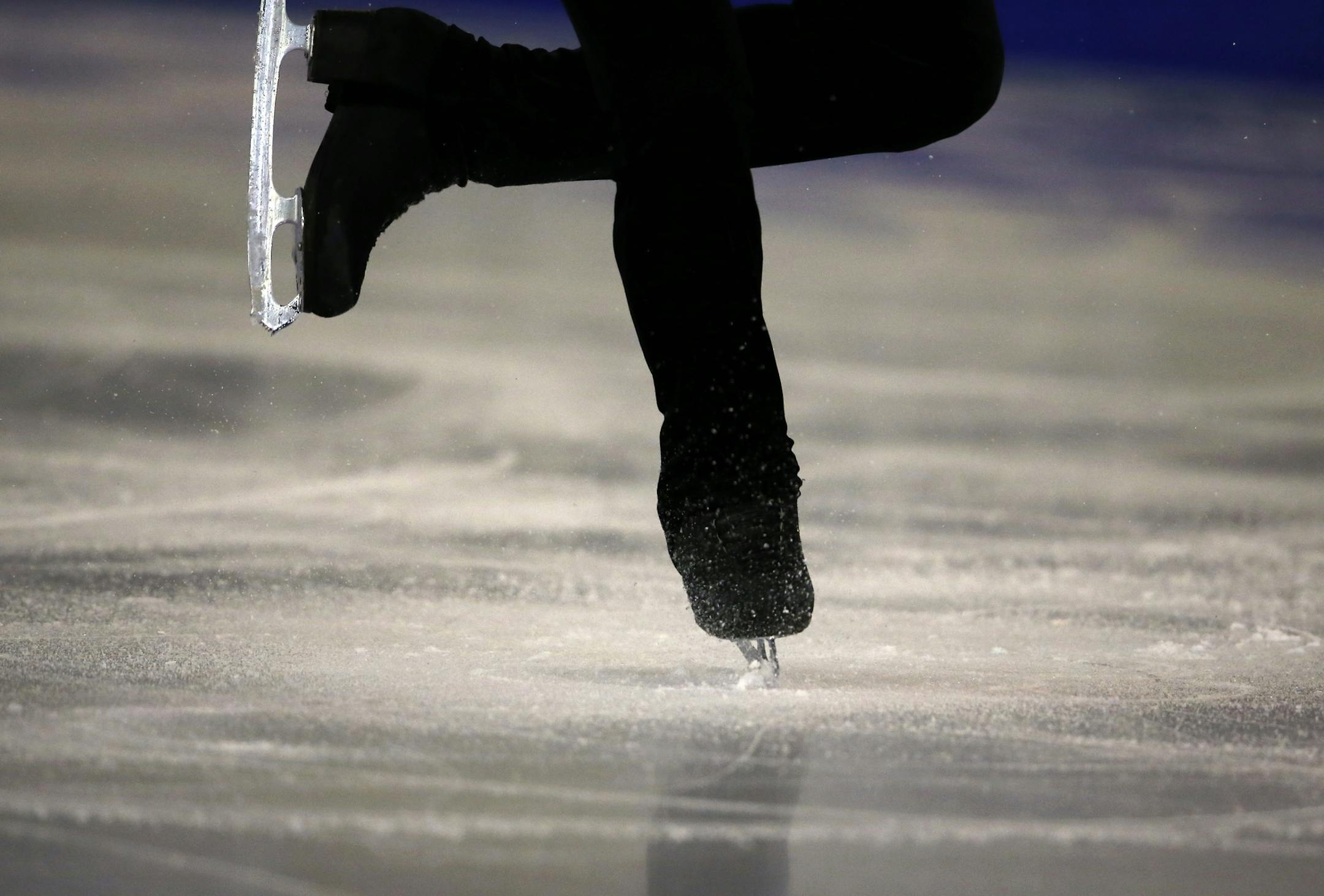 Tatsuki Machida, of Japan, performs in the men's short program at the Grand Prix Final figure skating competition in Barcelona, Spain, Friday, Dec. 12, 2014. (AP Photo/Emilio Morenatti)