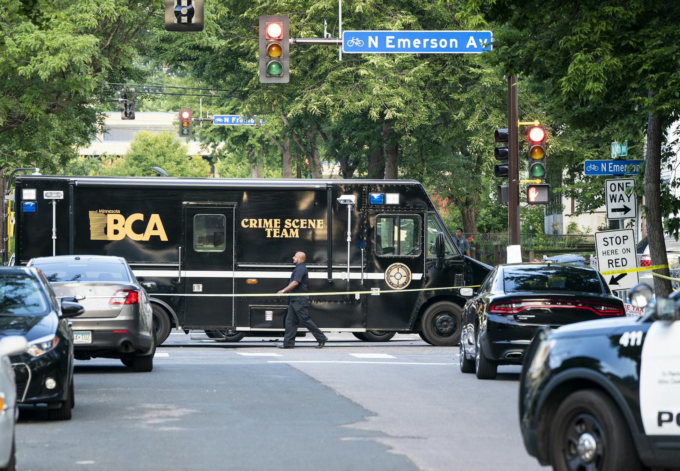 The state Bureau of Criminal Apprehension investigated the scene after Minneapolis police shot and killed a man early Friday morning on the 2400 block of Emerson Avenue North in Minneapolis. ] LEILA NAVIDI • leila.navidi@startribune.com BACKGROUND INFORMATION: The state Bureau of Criminal Apprehension investigated the scene after Minneapolis police shot and killed a man early Friday morning on the 2400 block of Emerson Avenue North in Minneapolis after responding to an apparent domestic i