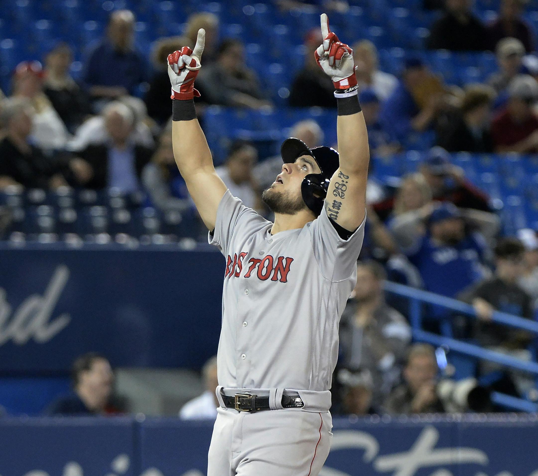 Boston Red Sox's Michael Chavis celebrates his home run against the Toronto Blue Jays during the 13th inning of a baseball game Wednesday, May 22, 2019, in Toronto. The Red Sox won 6-5. (Nathan Denette/The Canadian Press via AP)
