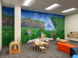 A group of Shakopee high school students painted a mural inside the children's waiting room of the Health and Human Services Department at the Scott C