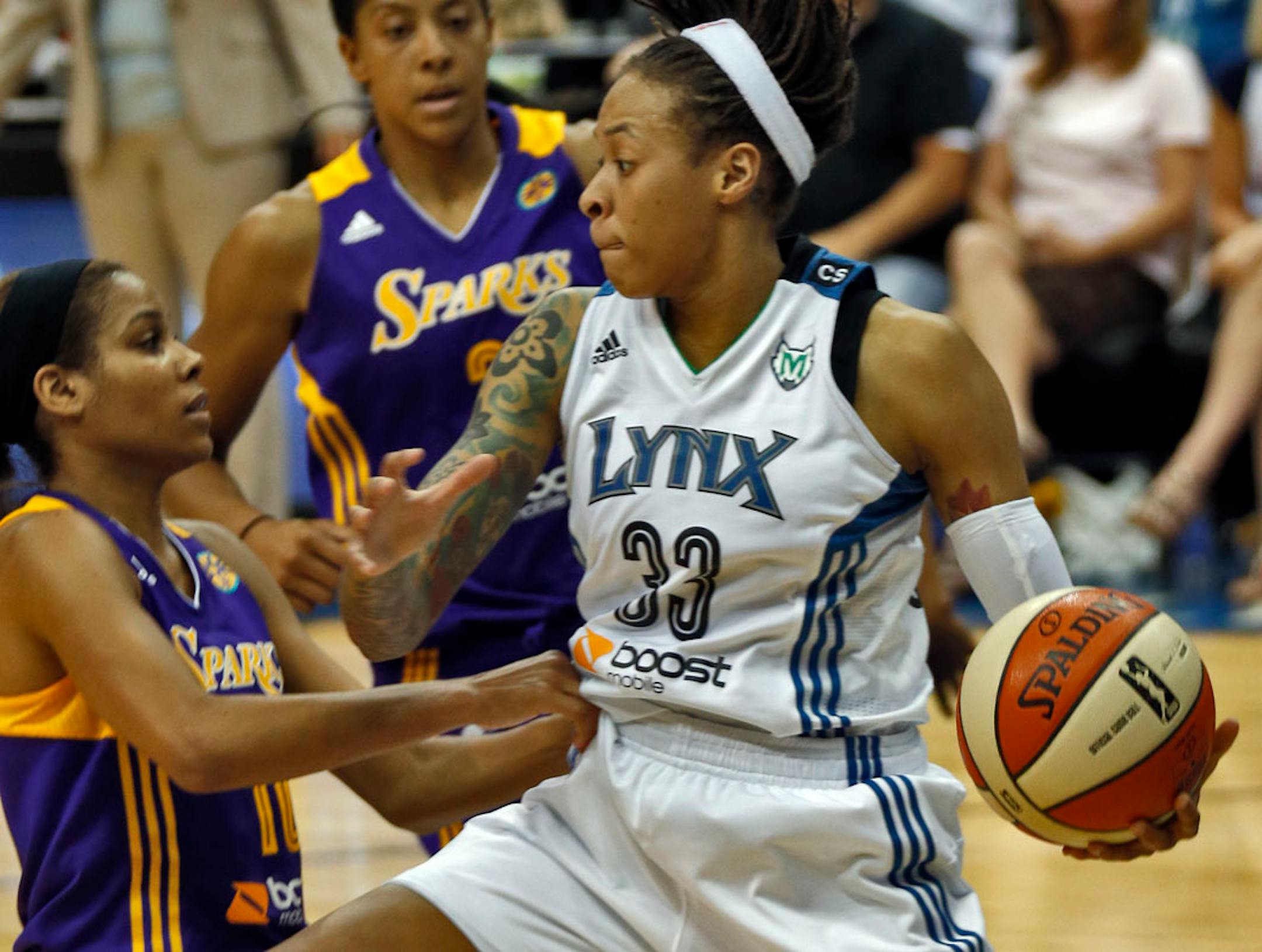 A sprained left ankle probably will keep the Lynx's Seimone Augustus (33) from playing Tuesday night against Atlanta.