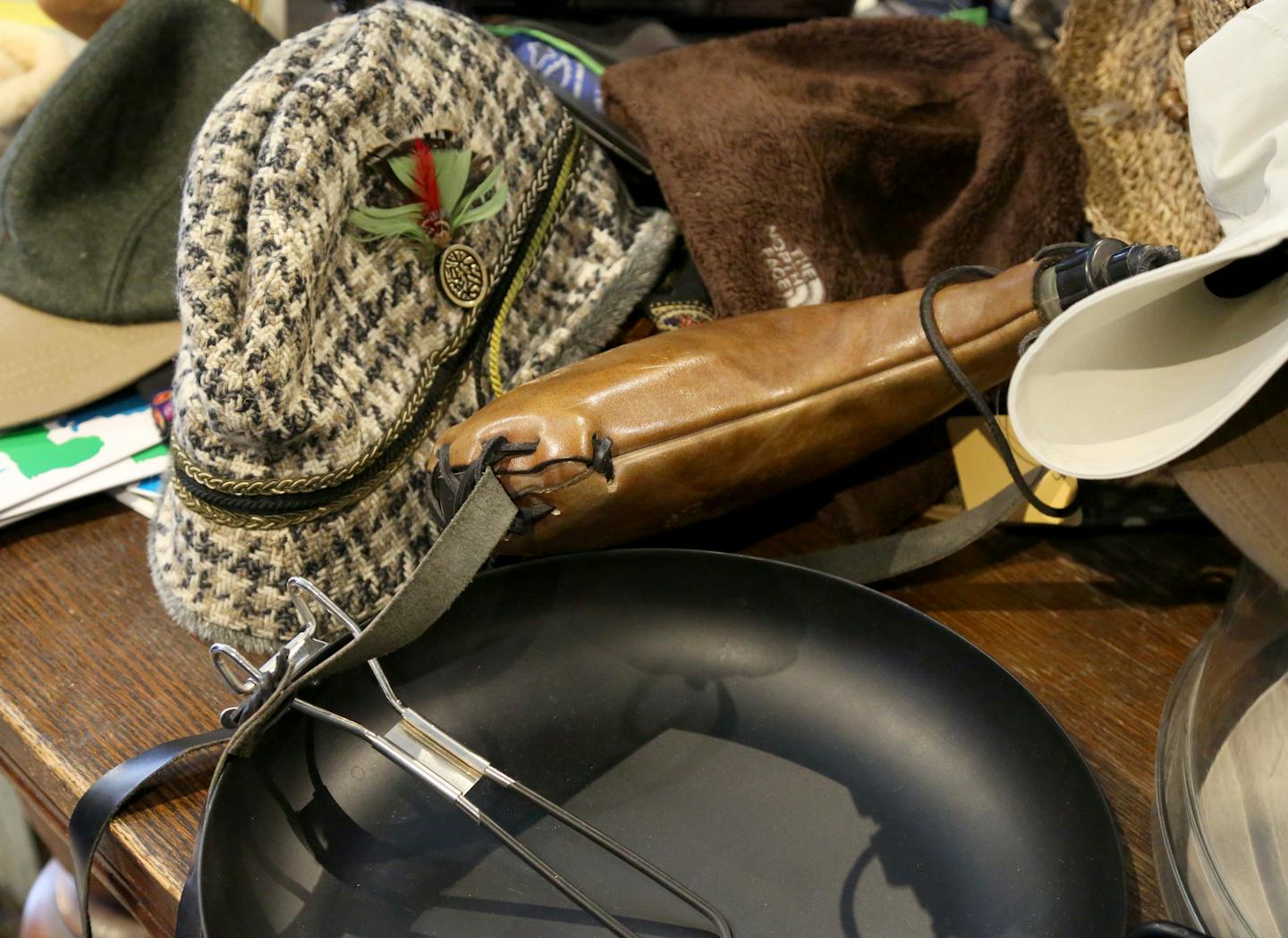 Used hats and a camping frying pan are among the items available at Repair Lair, Nancy Ford's Minneapolis consignment shop specializing in outdoor clothing, accessories and repair and seen Saturday, April 1, 2017, in Minneapolis, MN.] DAVID JOLES &#xef; david.joles@startribune.com Repair Lair in Minnepaolis is the latest consignment shop with a speciality--outdoor clothing, accessories and repair.**Nancy Ford,cq