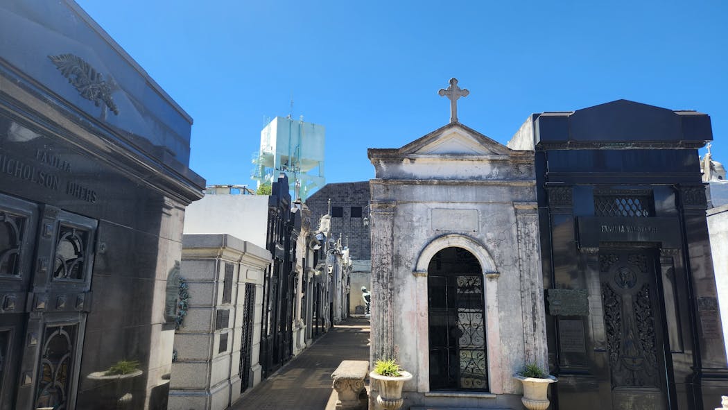 The Recoleta Cemetery (with a modern structure in the background) is a labyrinth of 14 acres of historic tombs in the heart of Buenos Aires.