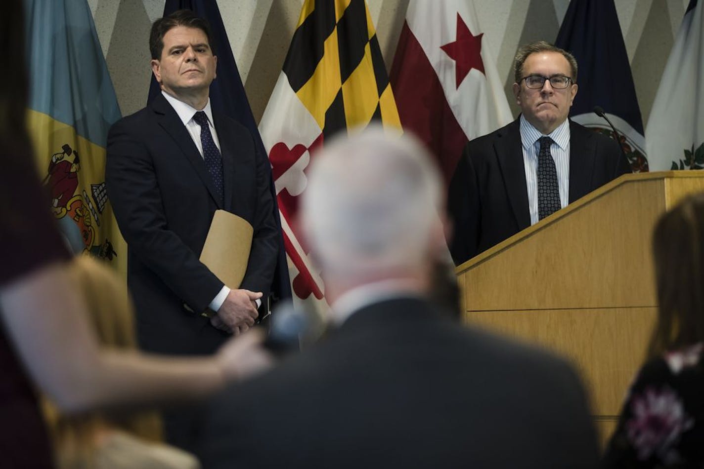 Acting Environmental Protection Agency Administrator Andrew Wheeler, right, and Mid-Atlantic Region administrator Cosmo Servidio, listen to a question during a news conference in Philadelphia, Thursday, Feb. 14, 2019. Under strong pressure from Congress, the EPA said Thursday that it will move ahead this year with a process that could lead to setting a safety threshold for a group of highly toxic chemicals in drinking water.