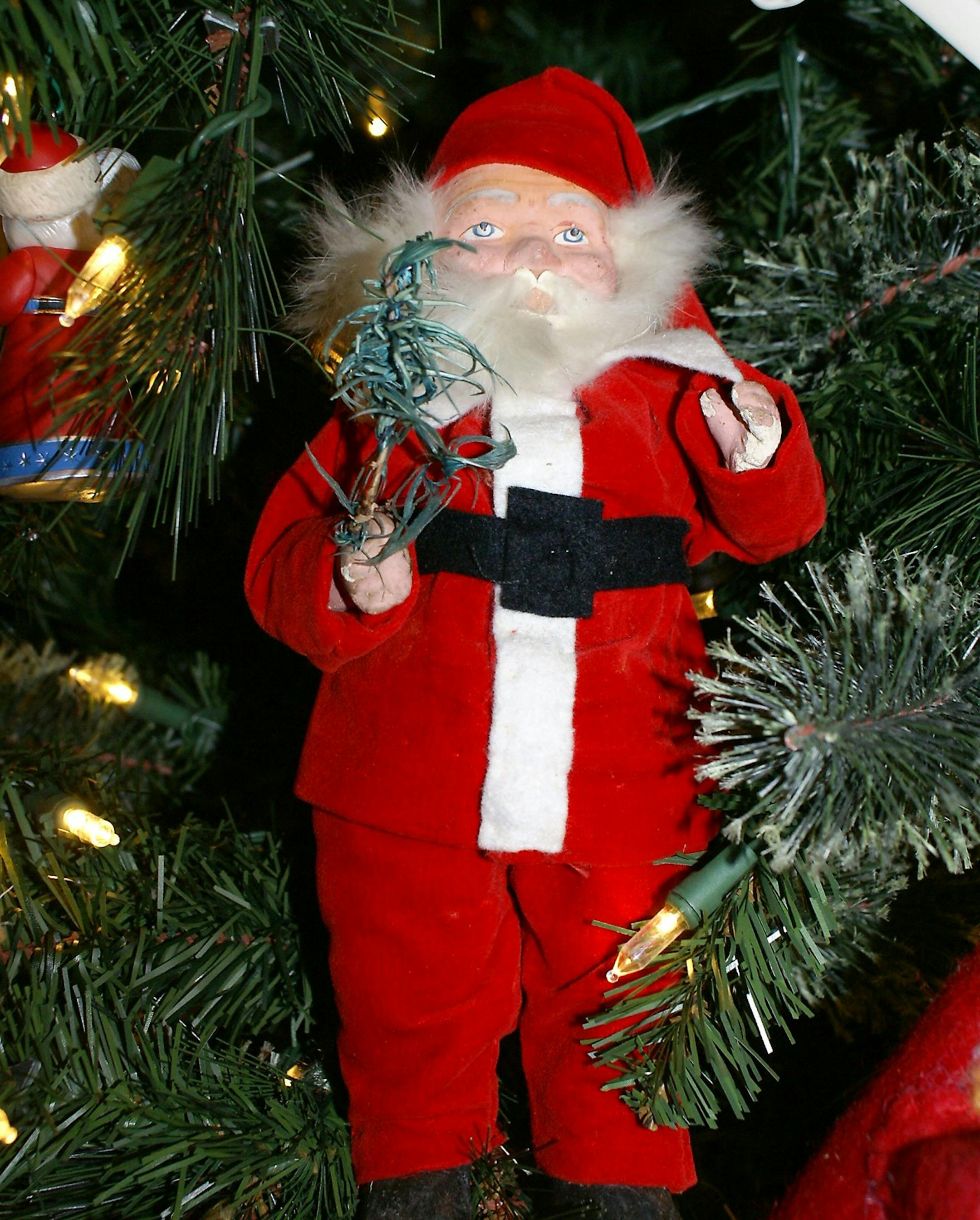 "This Santa has been in the center of our family Christmas tree for 72 years. Before that it was in the center of my Grandmother's tree since my father was a little boy. He would have been 104 years old in August 2019. We aren't sure how old it actually is, but it doesn't matter to me. It brings back the most fabulous memories. At one point my mother had to make Santa a new suit. It is the one decoration I place on our tree myself. The first decoration on the tree and the last to come off." Kare