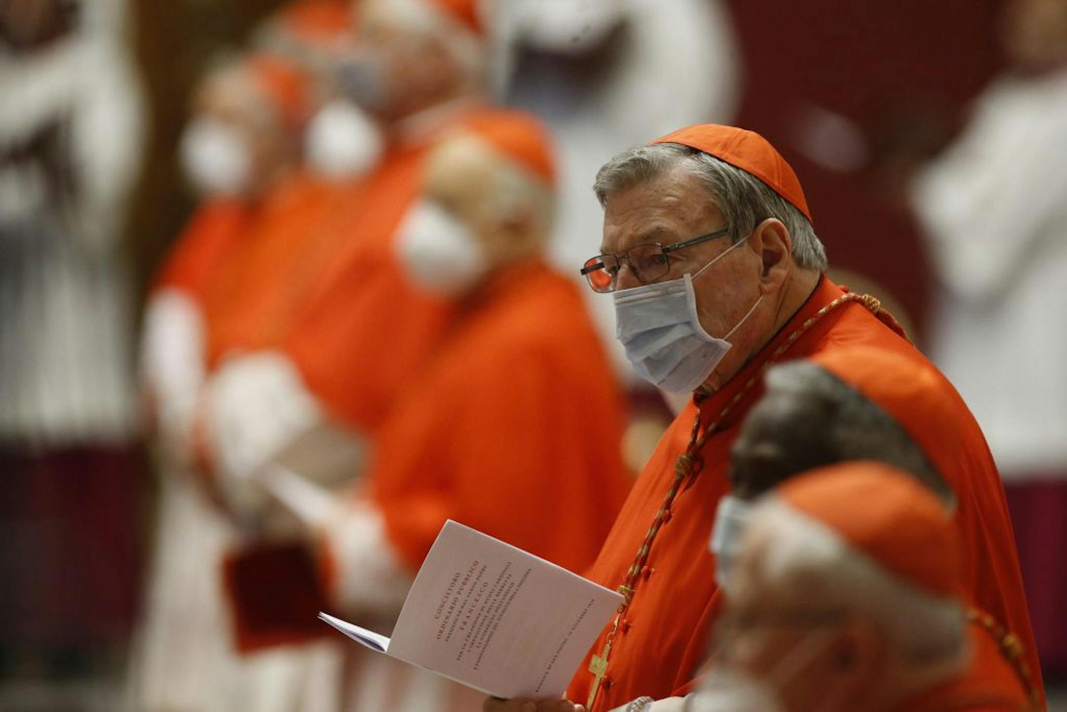 Cardinal George Pell attends a consistory ceremony where 13 bishops were elevated to a cardinal's rank in St. Peter's Basilica at the Vatican, Saturday, Nov. 28, 2020.