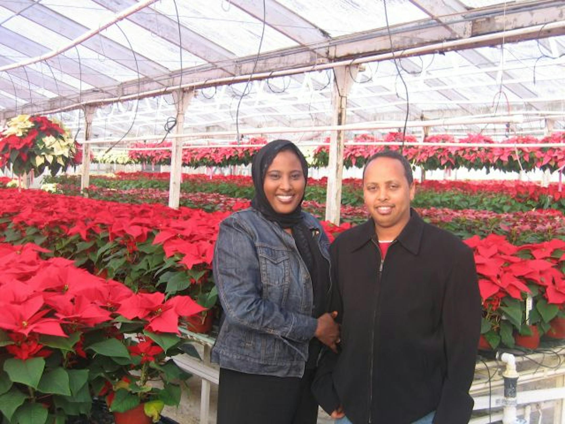 Novelist Yasmeen Maxamuud, with her husband, Abdikarim Hassan, lives in San Diego but likes Minneapolis because "it feels like home."