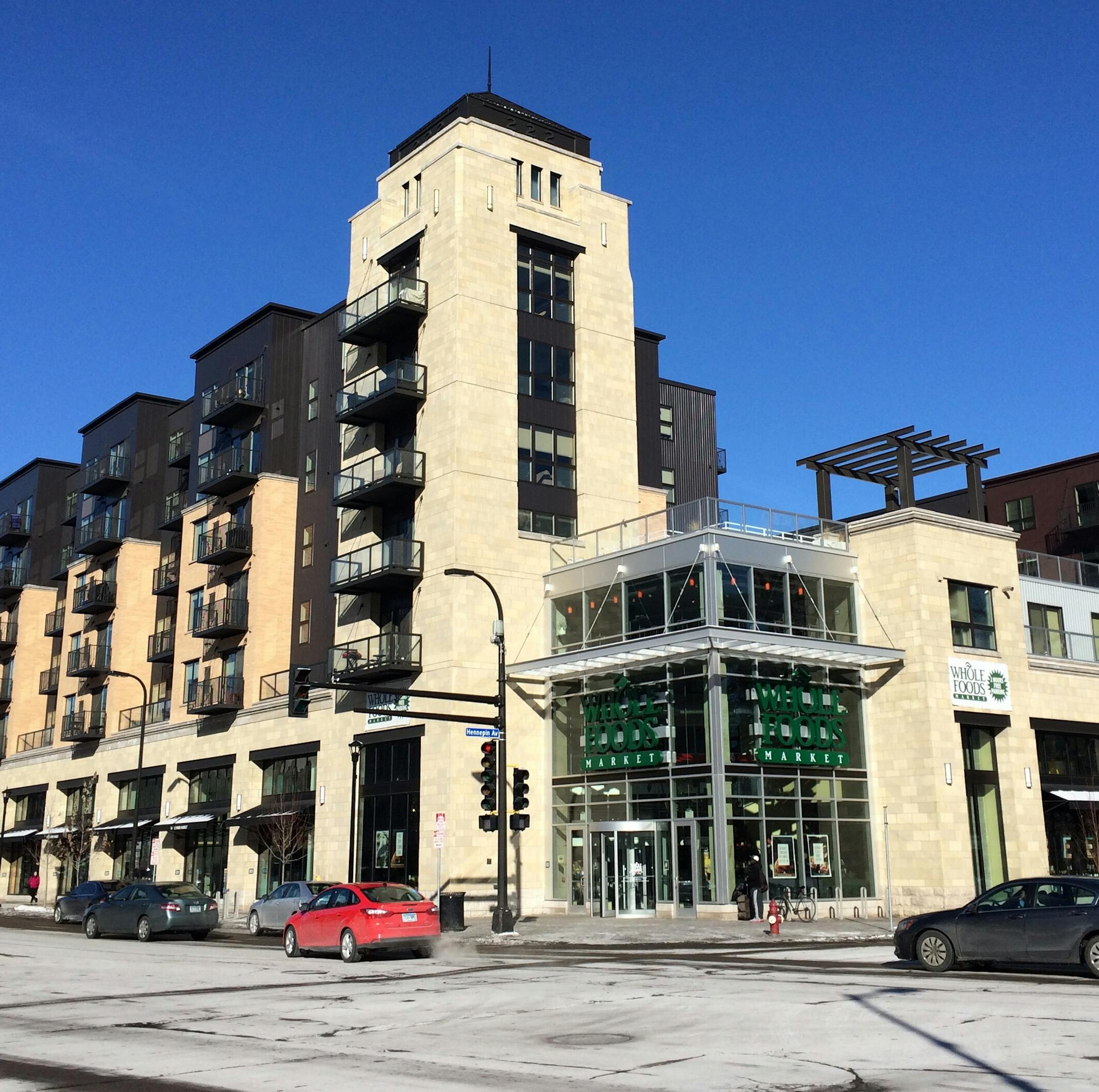 222 Hennepin, a 232-unit luxury apartment building atop a Whole Foods grocery, is on the market and expected to have a buyer within the next few months. The building opened last year.
