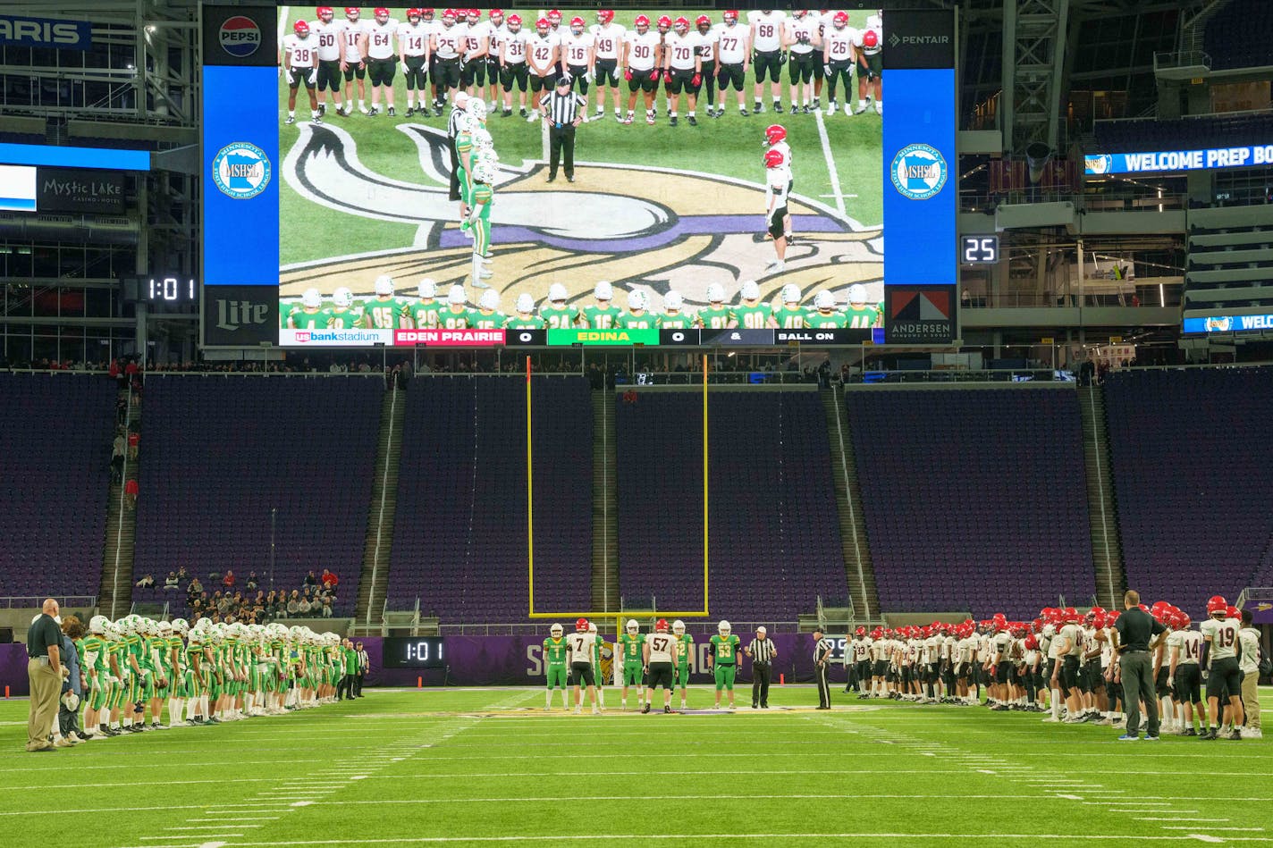 The coin toss between the Eden Prairie and Edina football teams in the Class 6A state semifinal football game between Eden Prairie and Edina played at U.S. Bank Stadium on Friday, Nov. 17, 2023. Photo by Matt Blewett, Special to Star Tribune matt@mattebphoto.com