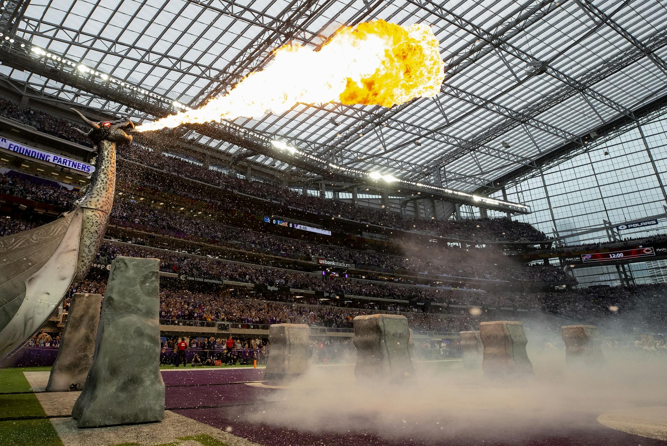 Fire shot from the dragon during pregame introductions.