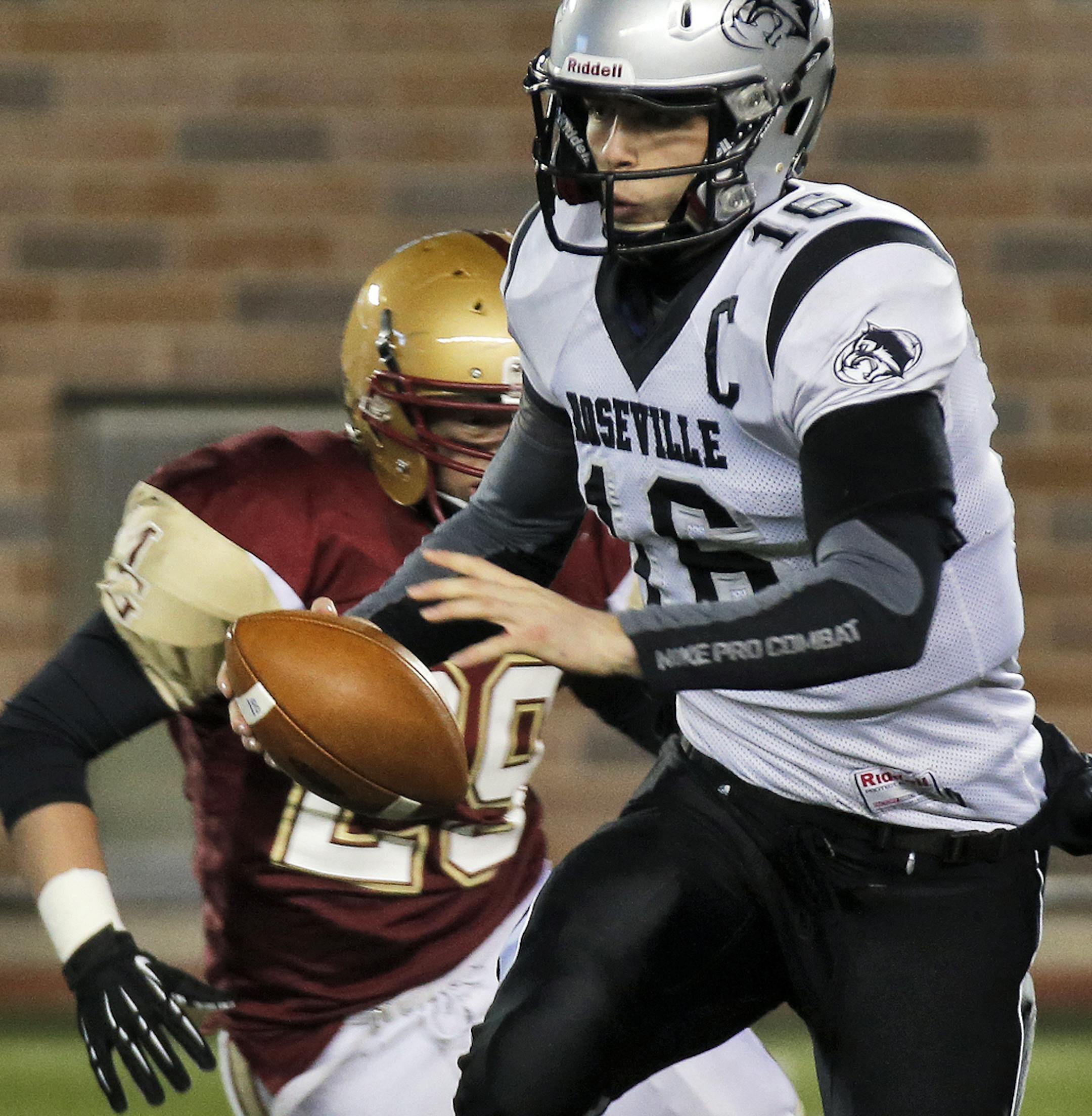 6A Prep Football Tournament game - Roseville vs. Maple Grove. Roseville quarterback Jacques Perra rolled out on a keeper. (MARLIN LEVISON/STARTRIBUNE(mlevison@startribune.com)
