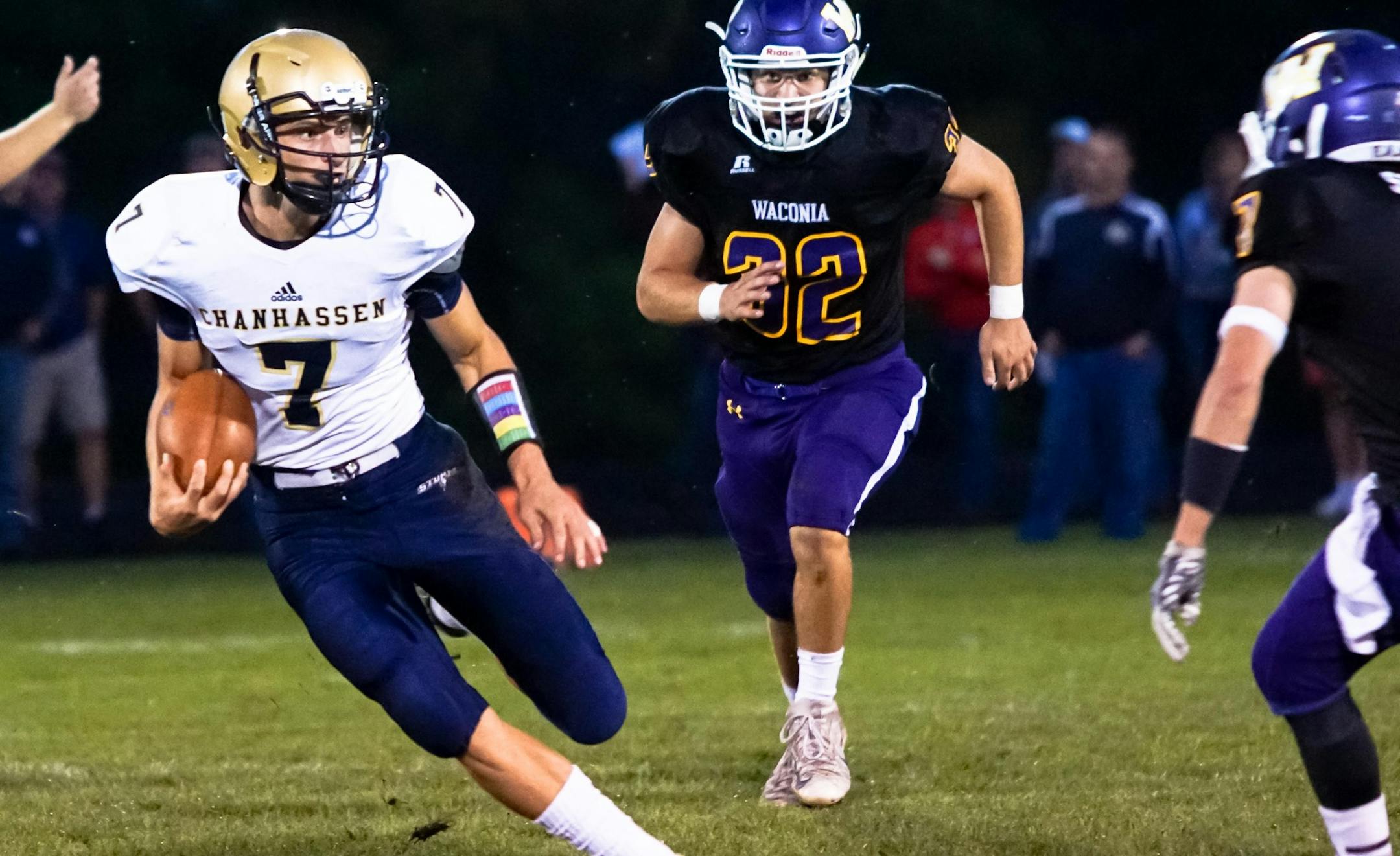 Chanhassen quarterback Alex Spillum ran with the ball in a game against Waconia on Sept. 16, 2016.
