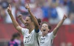 United States' Carli Lloyd, left, celebrates her goal with Meghan Klingenberg during the first half of the FIFA Women's World Cup soccer championship 