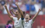 United States' Carli Lloyd, left, celebrates her goal with Meghan Klingenberg during the first half of the FIFA Women's World Cup soccer championship 