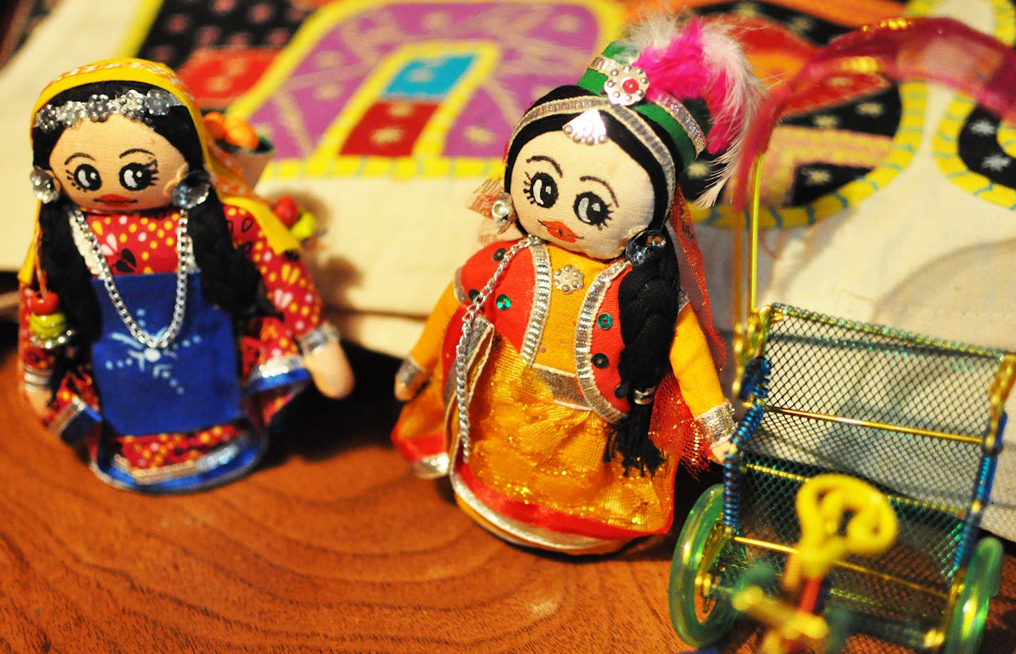 Items such as these dolls from India will be auctioned off at the upcoming fundraiser in Eagan. Photo by Liz Rolfsmeier, Special to the Star Tribune