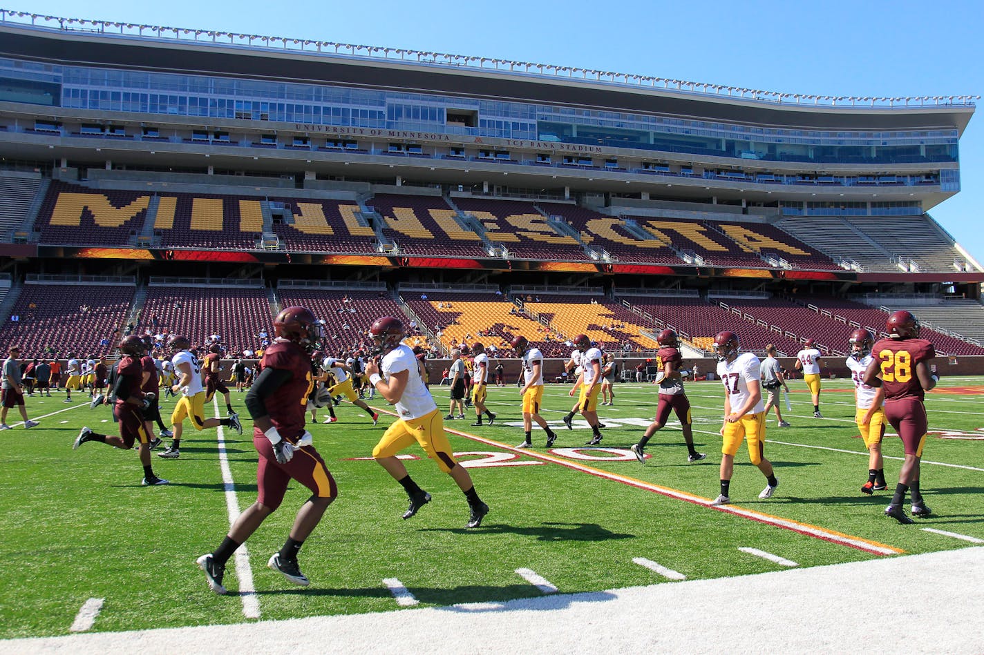 The Gophers warmed up before an intrasquad scrimmage at TCF Bank Stadium on Friday. Quarterback MarQueis Gray led the offense to three scores.