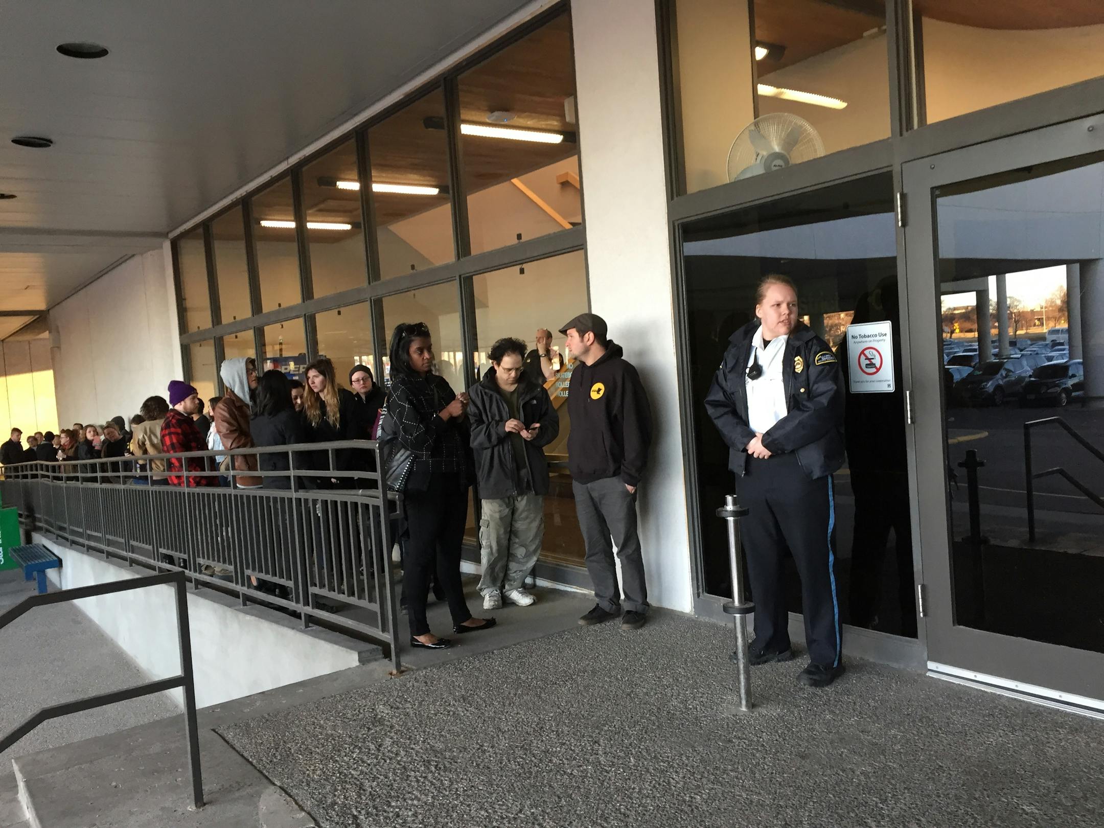 People gather outside the Hennepin County District Court in Edina (Southdale Service Center) in advance of Tuesday's hearing for people facing charges connected to a Black Lives Matter protest at the Mall of America.
