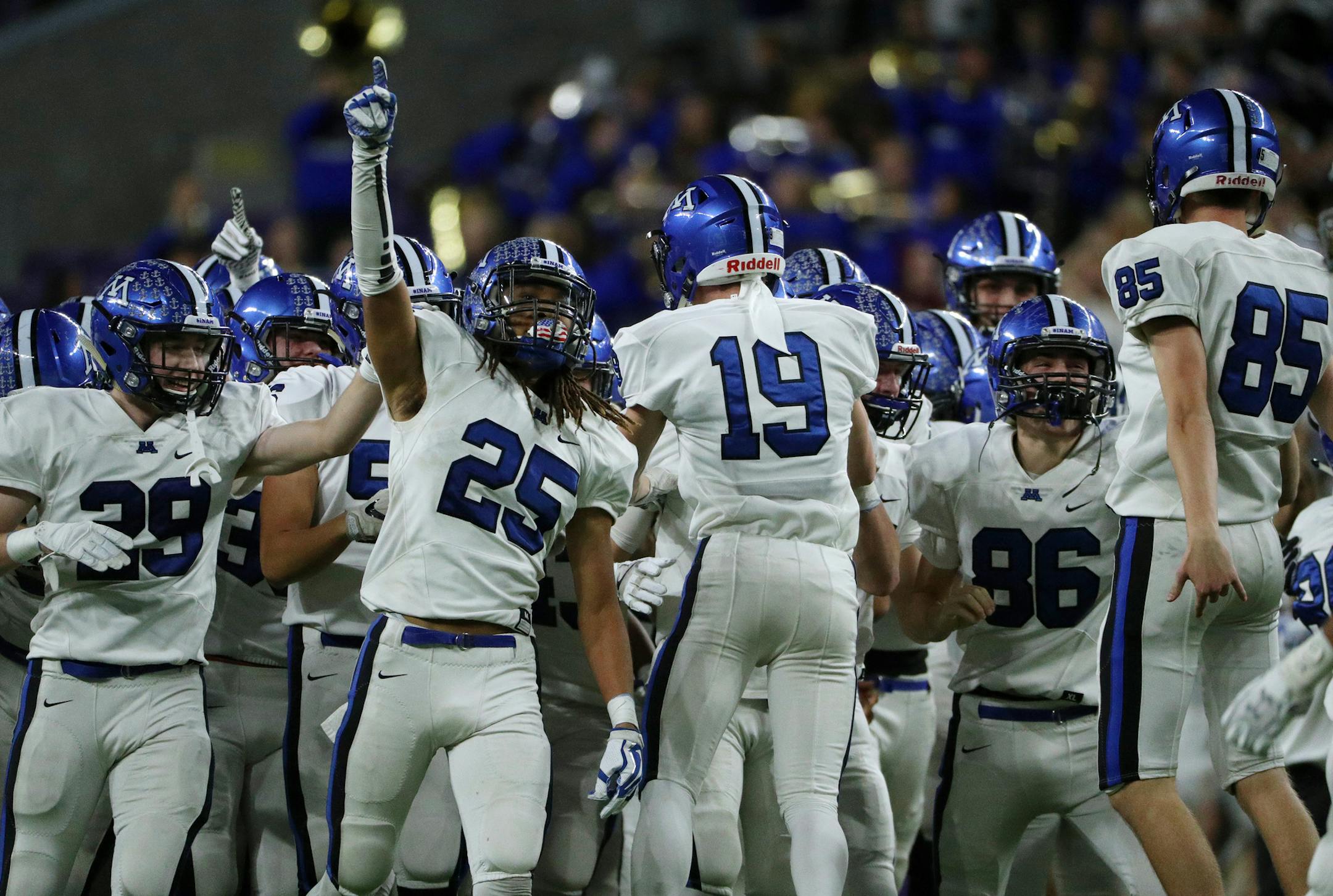 Minnetonka High School players including Minnetonka High School cornerback Raheem Brown (25) celebrated on the field after defeating Cretin-Derham Hall High School. ] ANTHONY SOUFFLE ï anthony.souffle@startribune.com Game action from a Class 6A semifinal football game between Minnetonka High School and Cretin-Derham Hall High School Friday, Nov. 17, 2017 at U.S. Bank Stadium in Minneapolis.