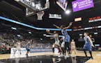 San Antonio Stars' Moriah Jefferson, center, shoots against the Minnesota Lynx during a WNBA basketball game in the AT&T Center, Tuesday, July 12, 201