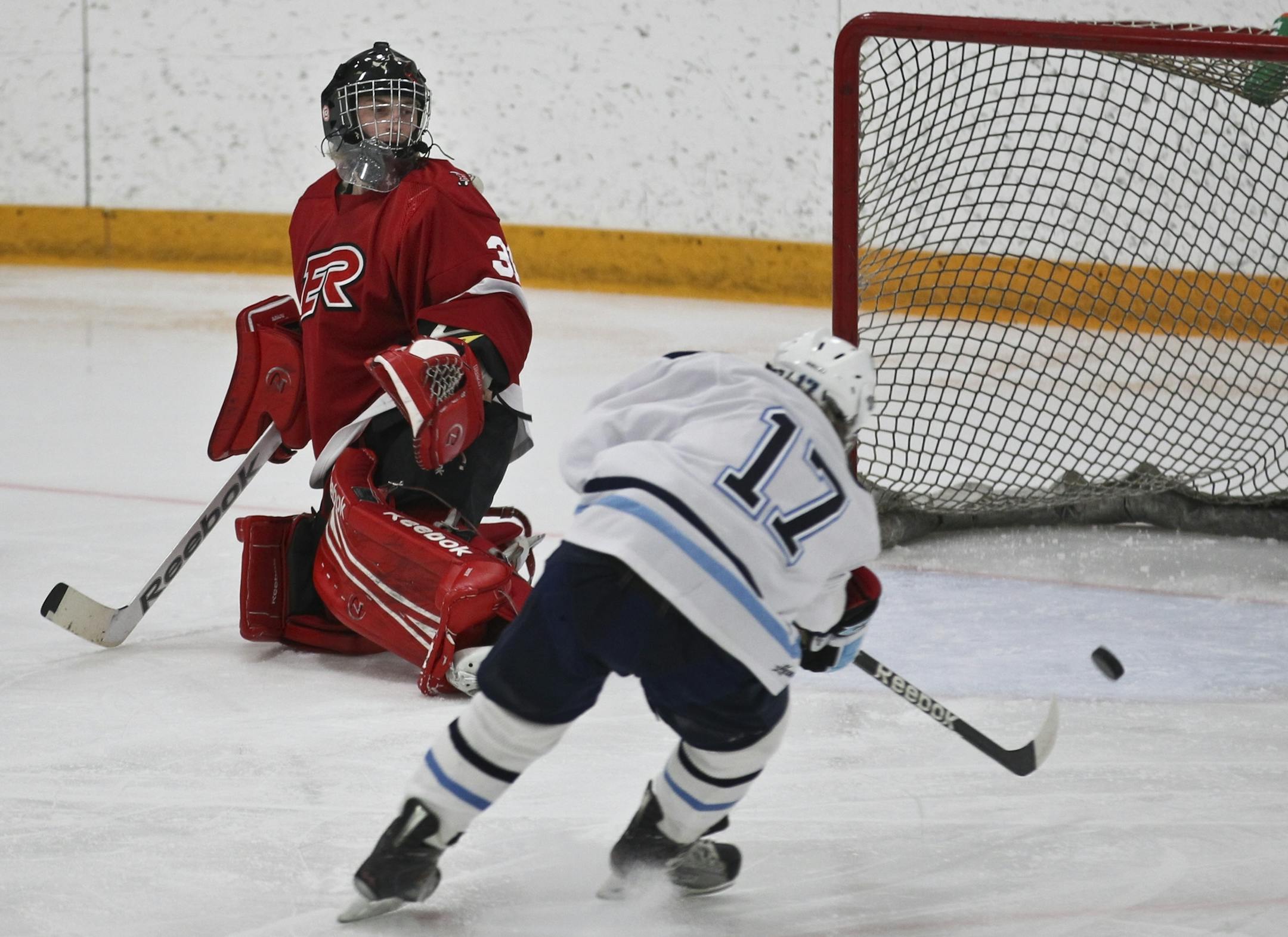Blaine's Luke Notermann scores just after he left the penalty box during the second period against Elk River/Zimmerman