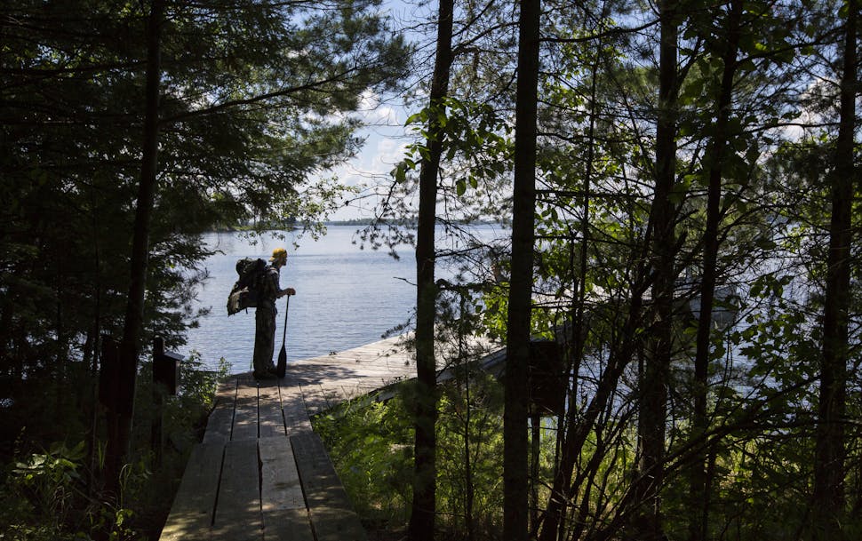Cameron Giebink of Minneapolis starts on the Locator Lake Trail for a few days of backcountry camping on the Kabetogama Penninsula in Voyageurs Nation