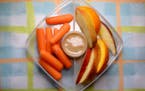 Salted Tahini Spread is an easy dip with carrots and apple slices. Oranges will keep the apples from turning brown too fast. (Diedra Laird/Charlotte O