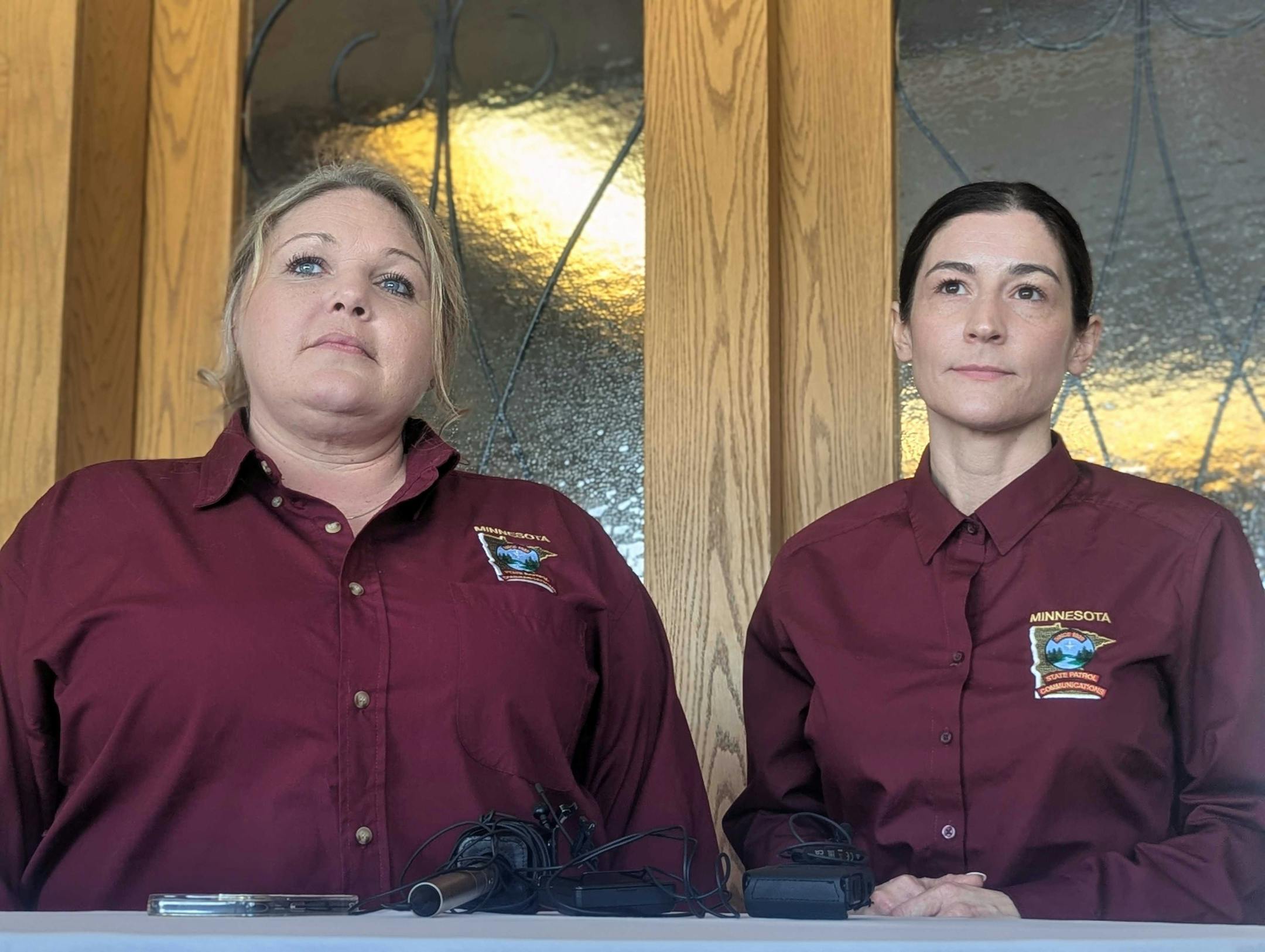 Radio communications operators Erin Madison (left) and Katie Geissler (right) speak after being honored at the Minnesota State Patrol's annual ceremony on Feb. 5.