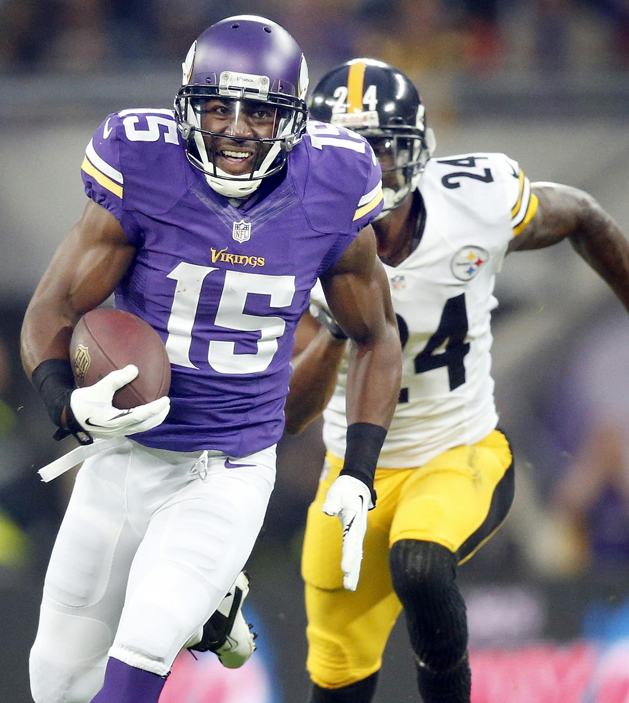 Minnesota Vikings receiver Greg Jennings (15) ran away from Pittsburg defender Ike Taylor (24) for a 70-yard touchdown catch and run the first quarter. ] CARLOS GONZALEZ cgonzalez@startribune.com September 29, 2013, London, England (Minnesota Vikings in London) Wembley Stadium, NFL, Minnesota Vikings vs. Pittsburg Steelers