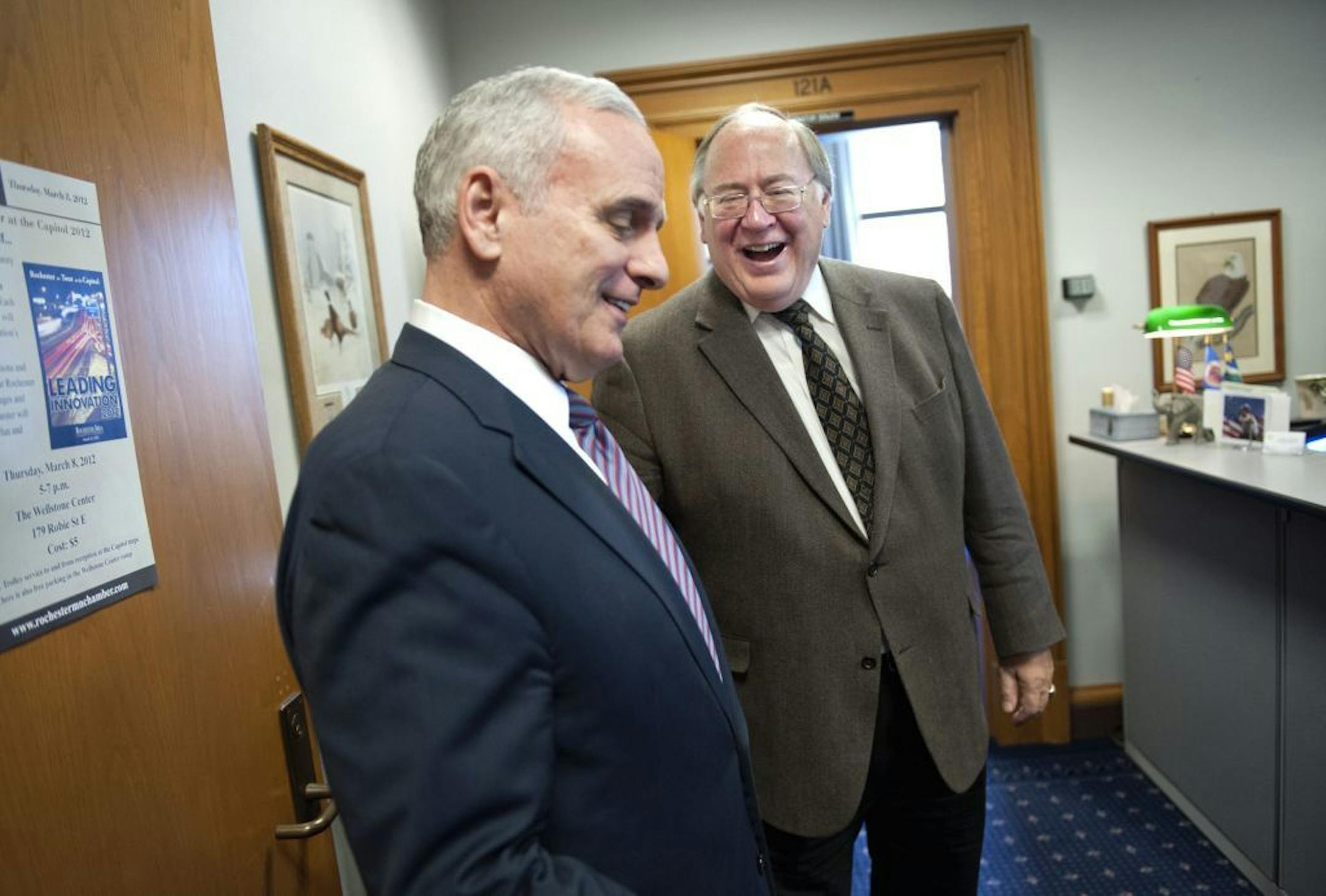 Minnesota Governor Mark Dayton visited Senate Majority Leader David Senjem in Senjem's office in the Capitol to to try to get his support for the Stadium bill.